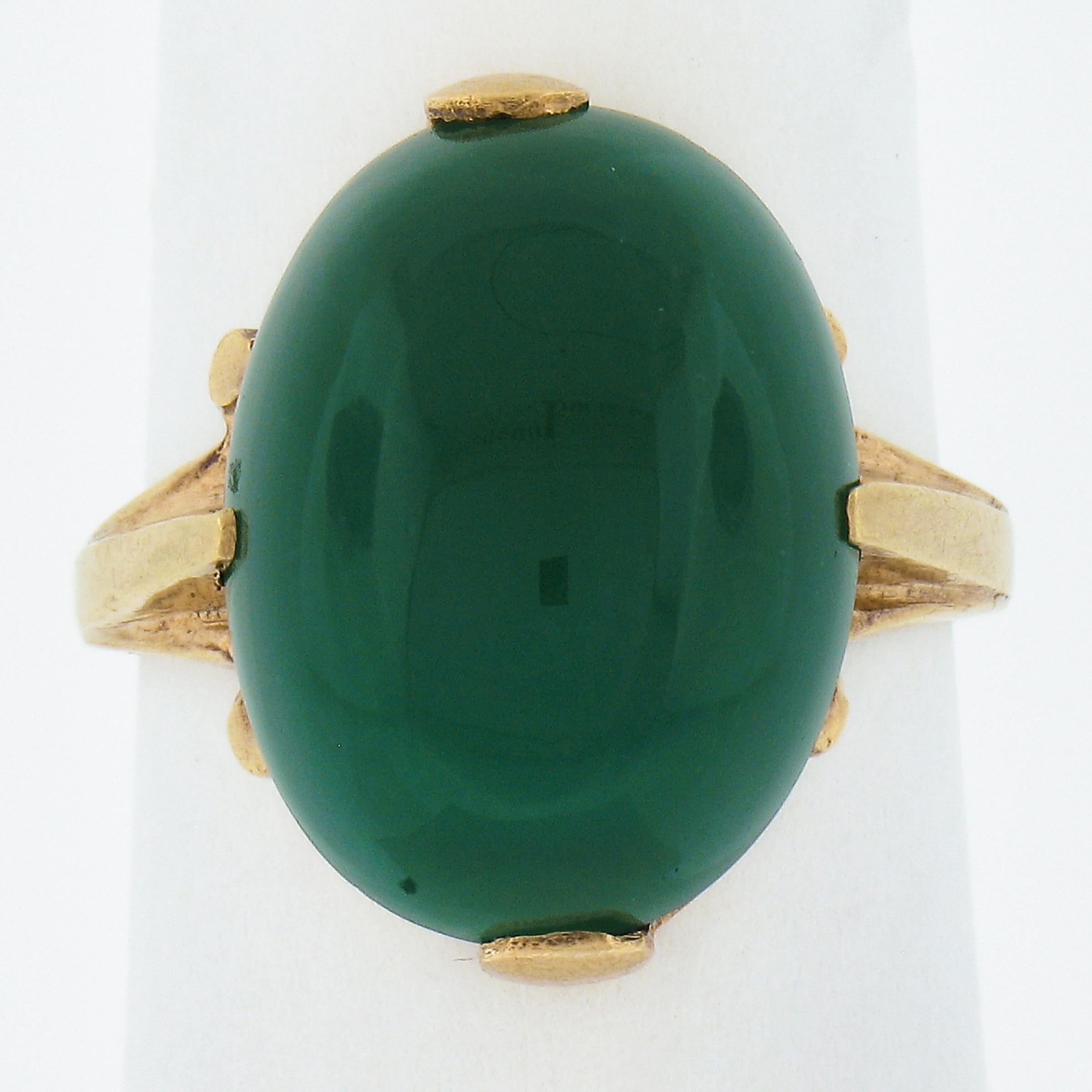 --Stone(s):--
(1) Natural Genuine Chrysoprase- Panel Prong Set - Deep Apple Green Color - 15.6x12mm (approx.)

Material: 14K Solid Yellow Gold
Weight: 5.01 Grams
Ring Size: 5.5 (Fitted on a finger. We can custom size this ring. Please contact us