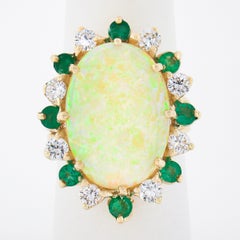 Vintage 14k Gold Oval Cabochon Opal Round Diamond & Emerald Halo Cocktail Ring