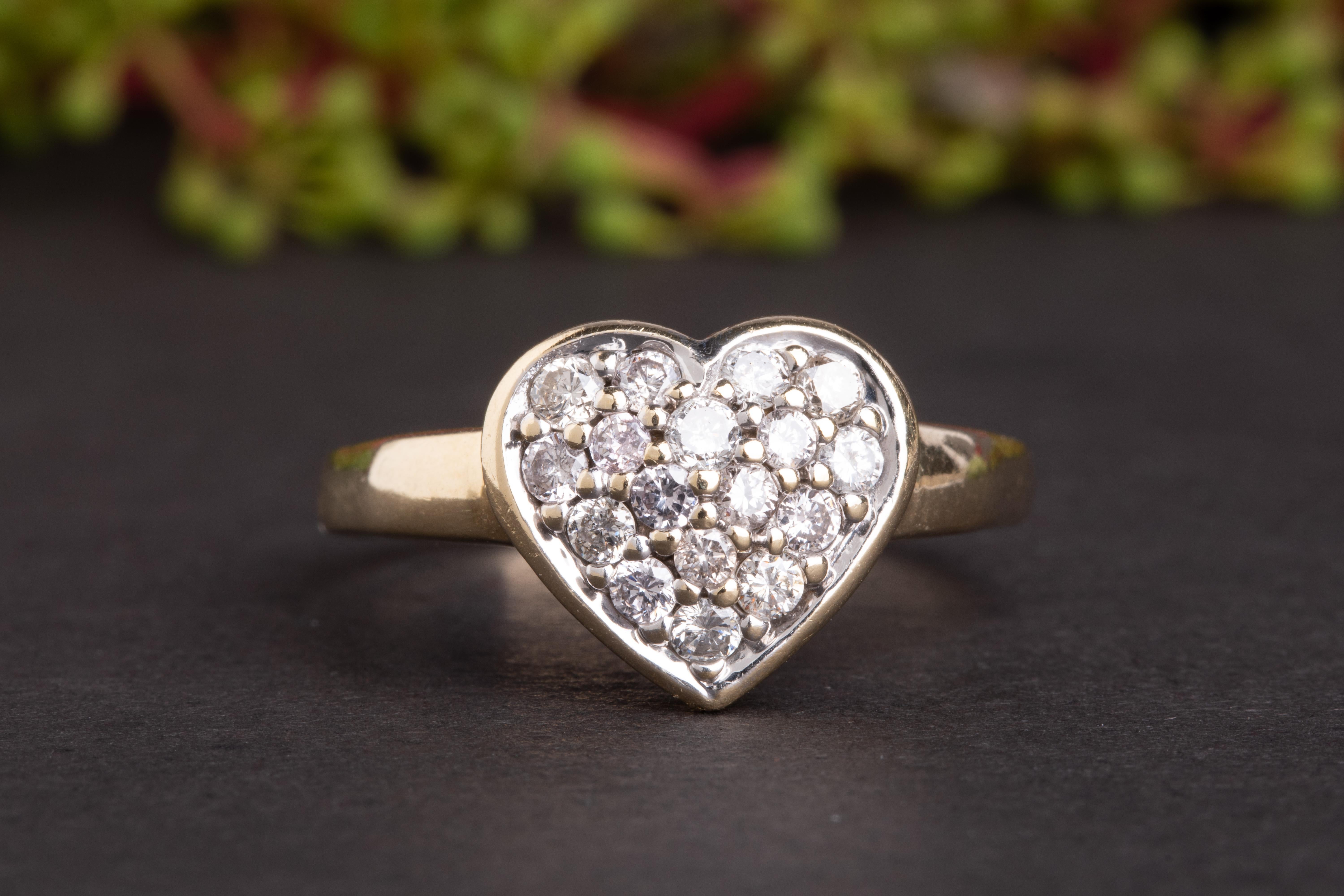 This beautiful and rather massive diamond heart ring is looking for a new home! Coming from Germany, this cutie dates back to the mid-20th century and is preserved in a superb state.

Made of 14ct gold this ring is set with a genuine pave setting