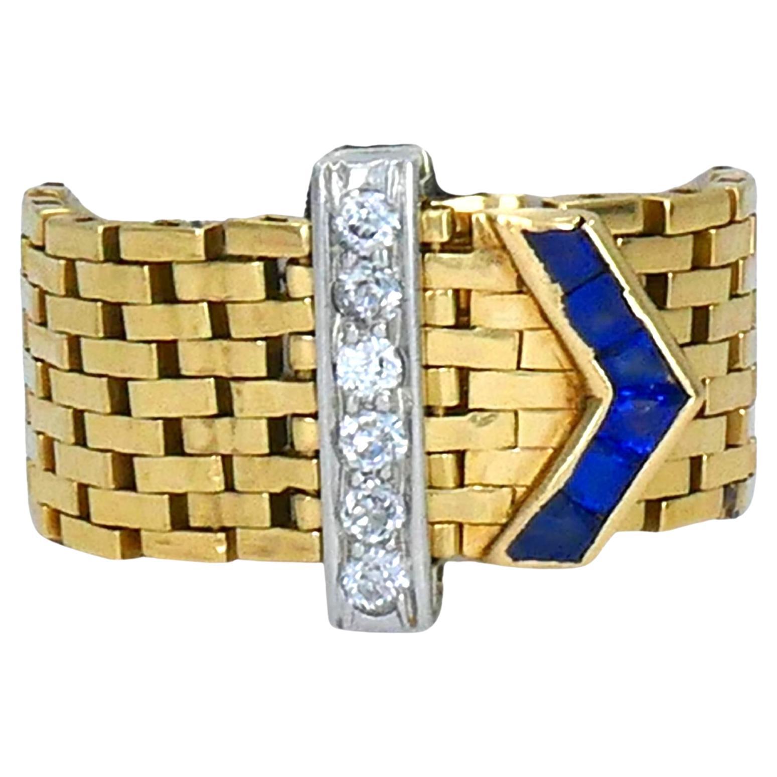 Anello con fibbia vintage in oro 14k e platino con diamante e zaffiro in vendita