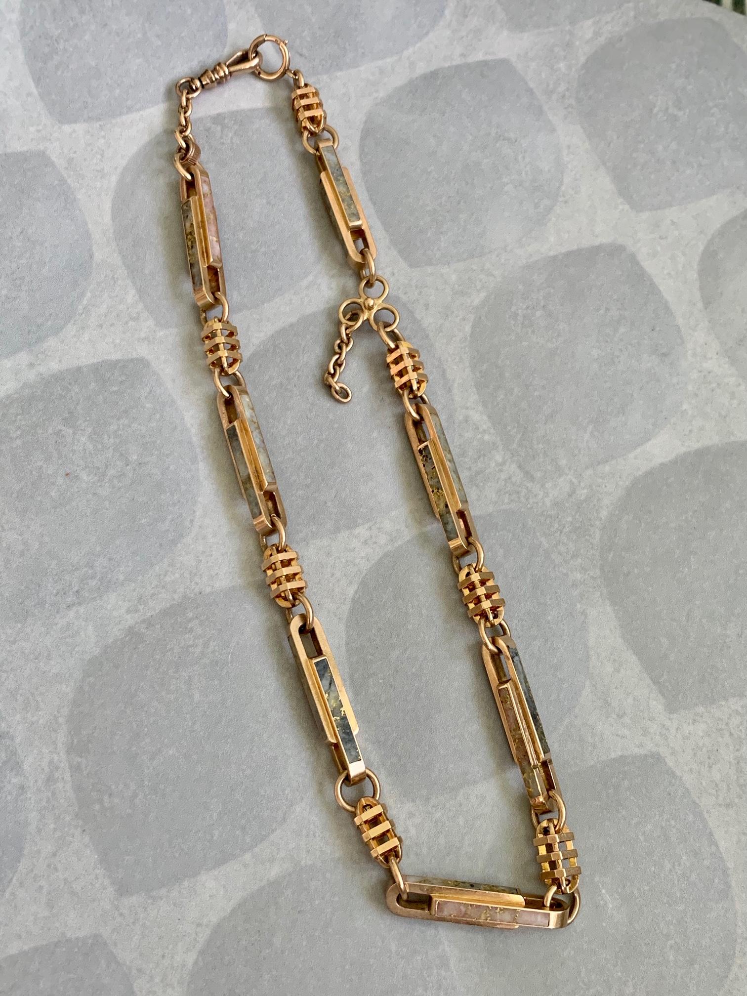 This gold quartz watch 14k gold chain is taken directly from our owner's personal collection.  
Gold quartz is rare and highly desirable. Gold-Bearing Quartz is one of the world's rarest forms of natural gold. It is found underground by hard rock