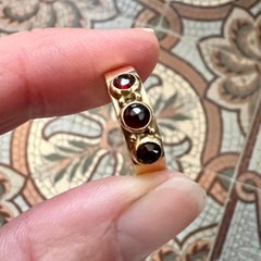 Vintage 14K Gold Ring with Three Garnet Gemstones