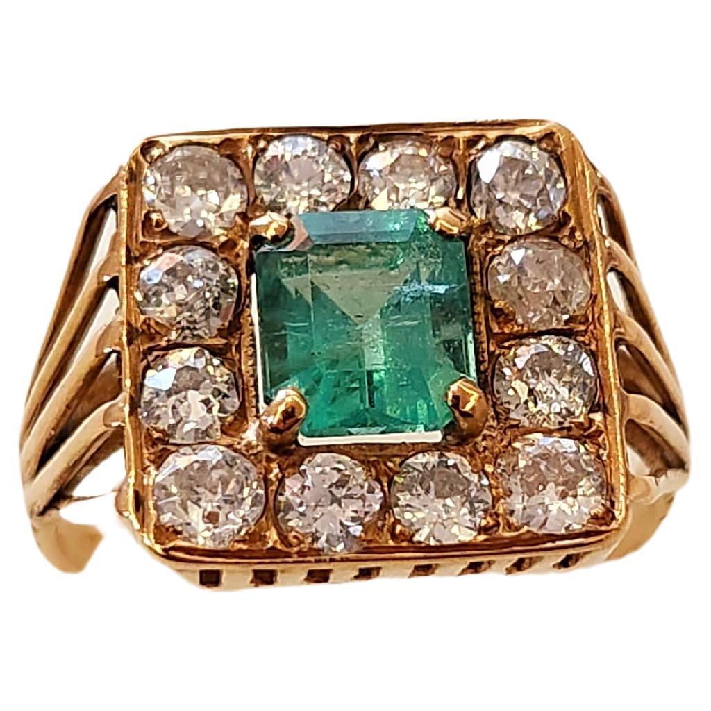 Vintage 14k gold russian ring centered with 1 natural rich green emerald with a diameter of 5.70mm×6.70mm flanked with old european cut diamonds estimate weight of 0.80 ct ring head diameterb13.40mm×13.70mm hall marked with initial maker mark in