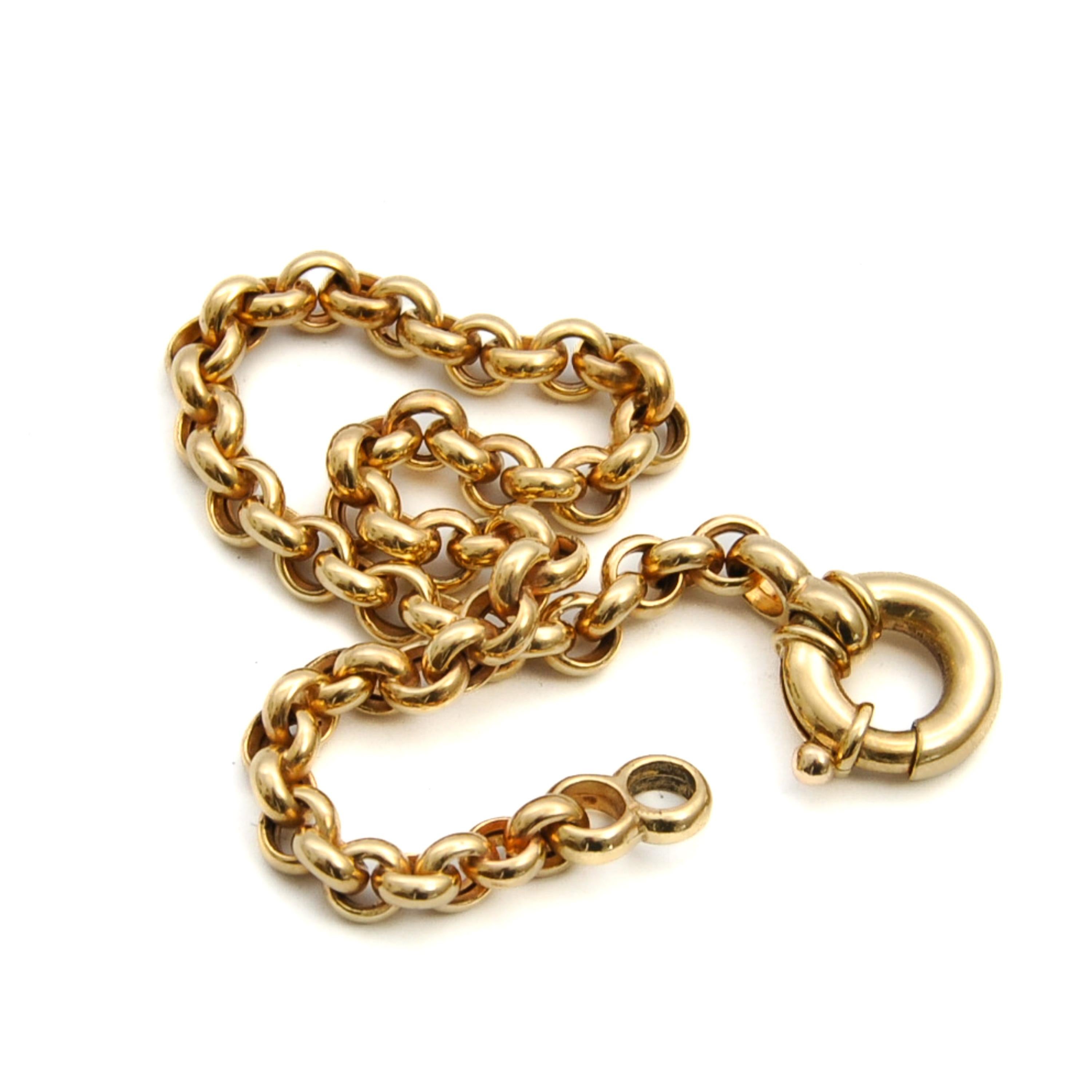 Un charmant bracelet vintage en or 14 carats avec anneau à ressort de marin et chaîne rolo. Chaque maillon rond est parfaitement poli et les maillons s'entrelacent pour former cette magnifique chaîne. Le bracelet est prêt à être porté seul ou
