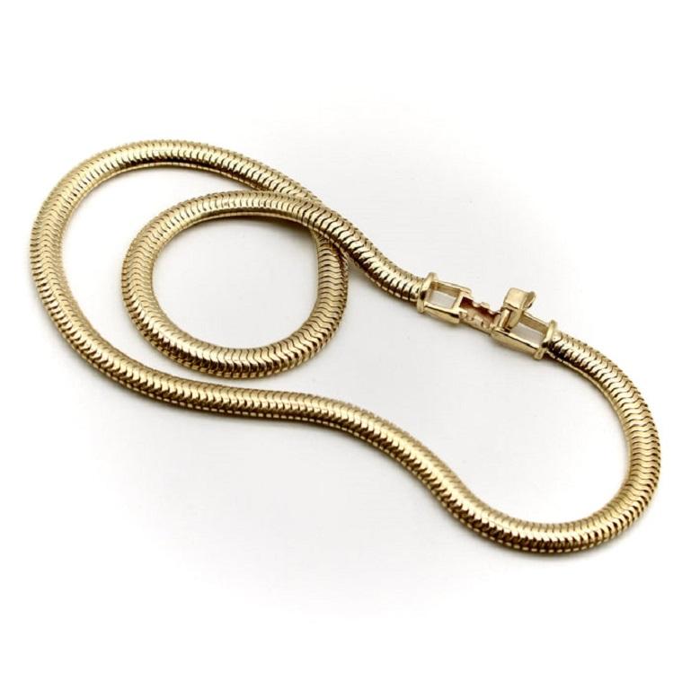 Vintage 14K Gold Thick Snake Chain Necklace, circa 1970’s

Made from beautiful 14k gold, this vintage snake chain is the perfect length for a slinky choker necklace. With a width of 5.3 mm, this is a wonderfully thick chain with substantial presence