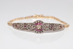 Bracciale vintage in oro 14k e argento con diamanti naturali e rubini calibrati