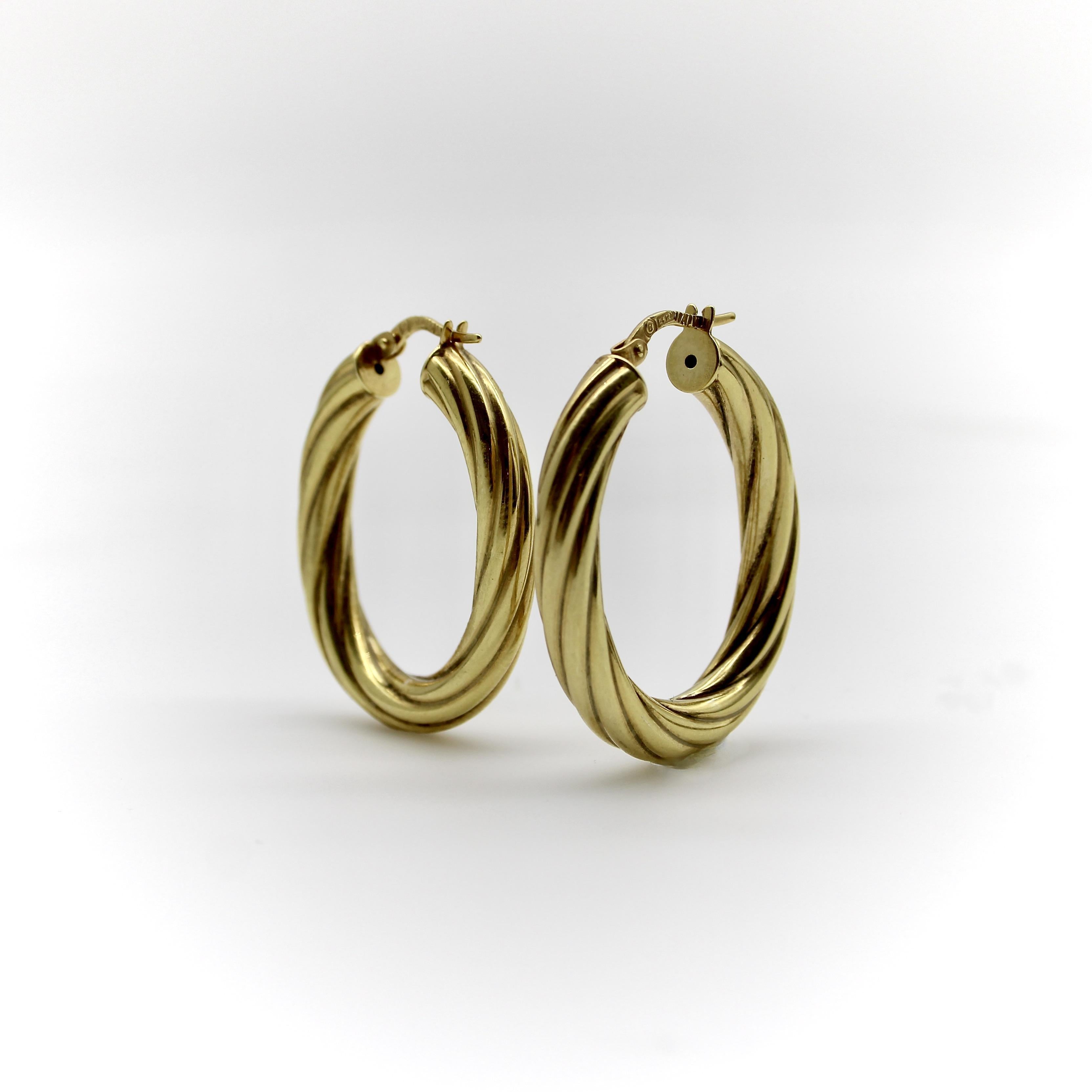 Modern Vintage 14K Gold Twisted Oval Italian Hoops For Sale
