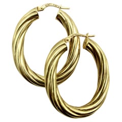 Vintage 14K Gold Twisted Oval Italian Hoops