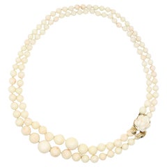 Collana vintage in oro 14 carati con perline di corallo a due piani