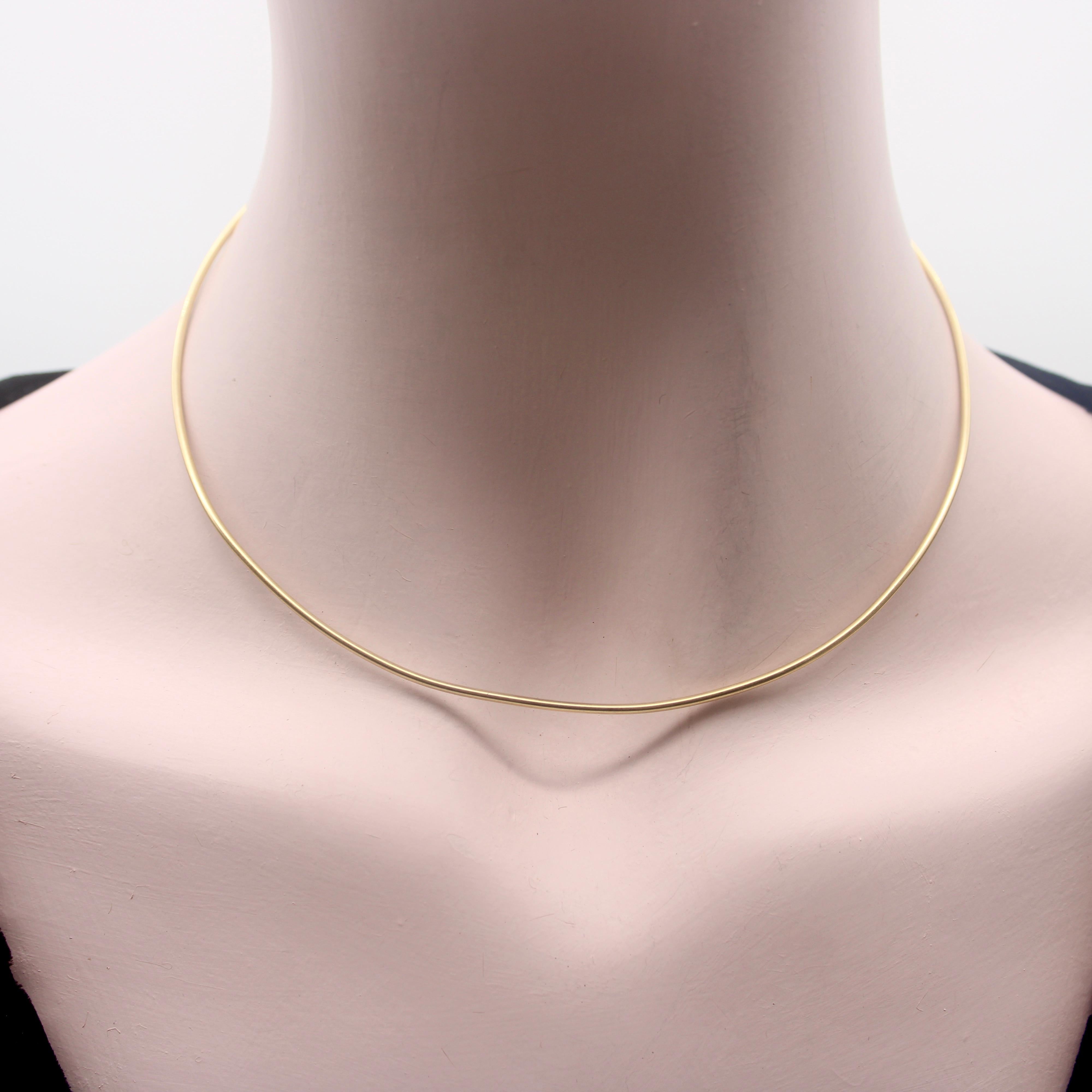 The gold wire choker is a jewelry staple made popular in the 1960’s and 70’s. It still has a place in contemporary fashion because of its simplicity and flexibility. The gold wire can be worn alone or you can slide your favorite charms on and off of