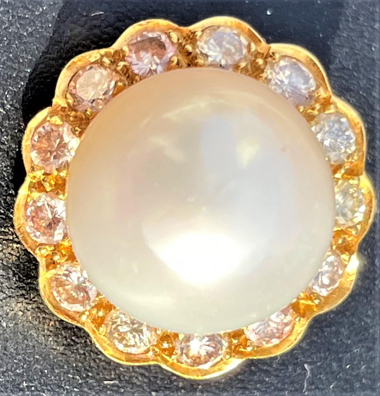 Make a statement with these stunning, classic, beautiful vintage 14k gold clip-on earrings with diamonds and a pearl are a luxurious and elegant jewelry accessory that combines the beauty of gold, the brilliance of diamonds, and the timeless allure