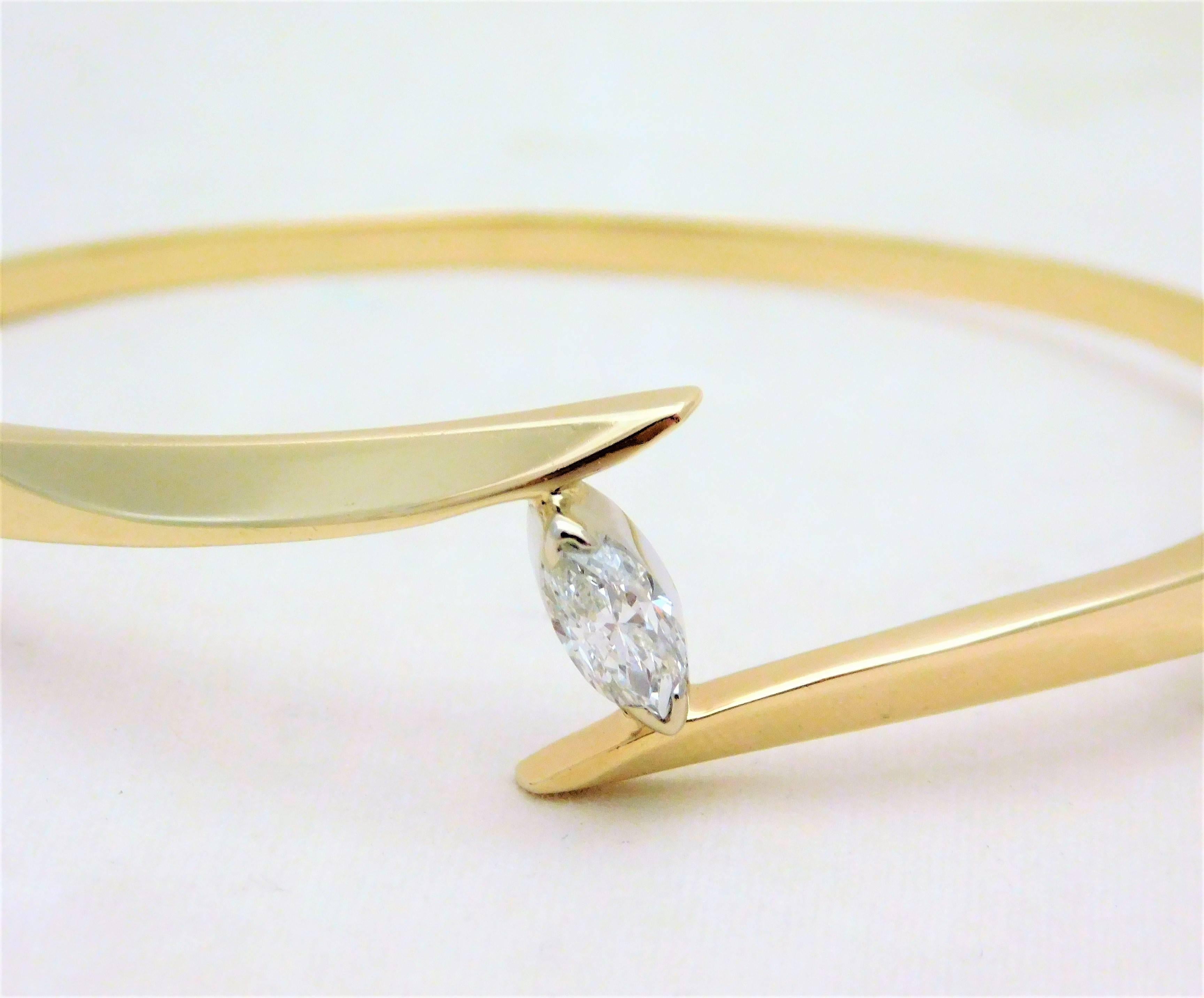 Vintage 14 Karat Marquise Diamond Bangle Bracelet In Excellent Condition For Sale In Metairie, LA