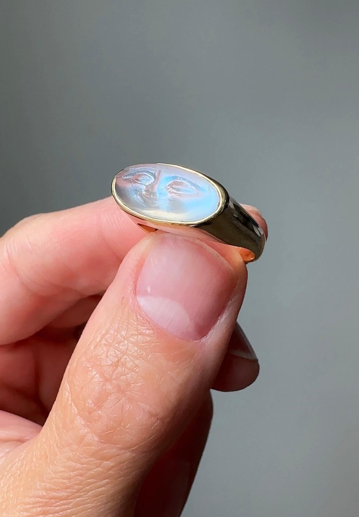 Both luminous and beautifully carved this whimsical vintage man-in-the-moon is something special. 🌙 The moonstone is transparent with a magical blue luster mounted in 14k yellow gold.  Currently a ring size 5 3/4.

 

Weight: 4.9