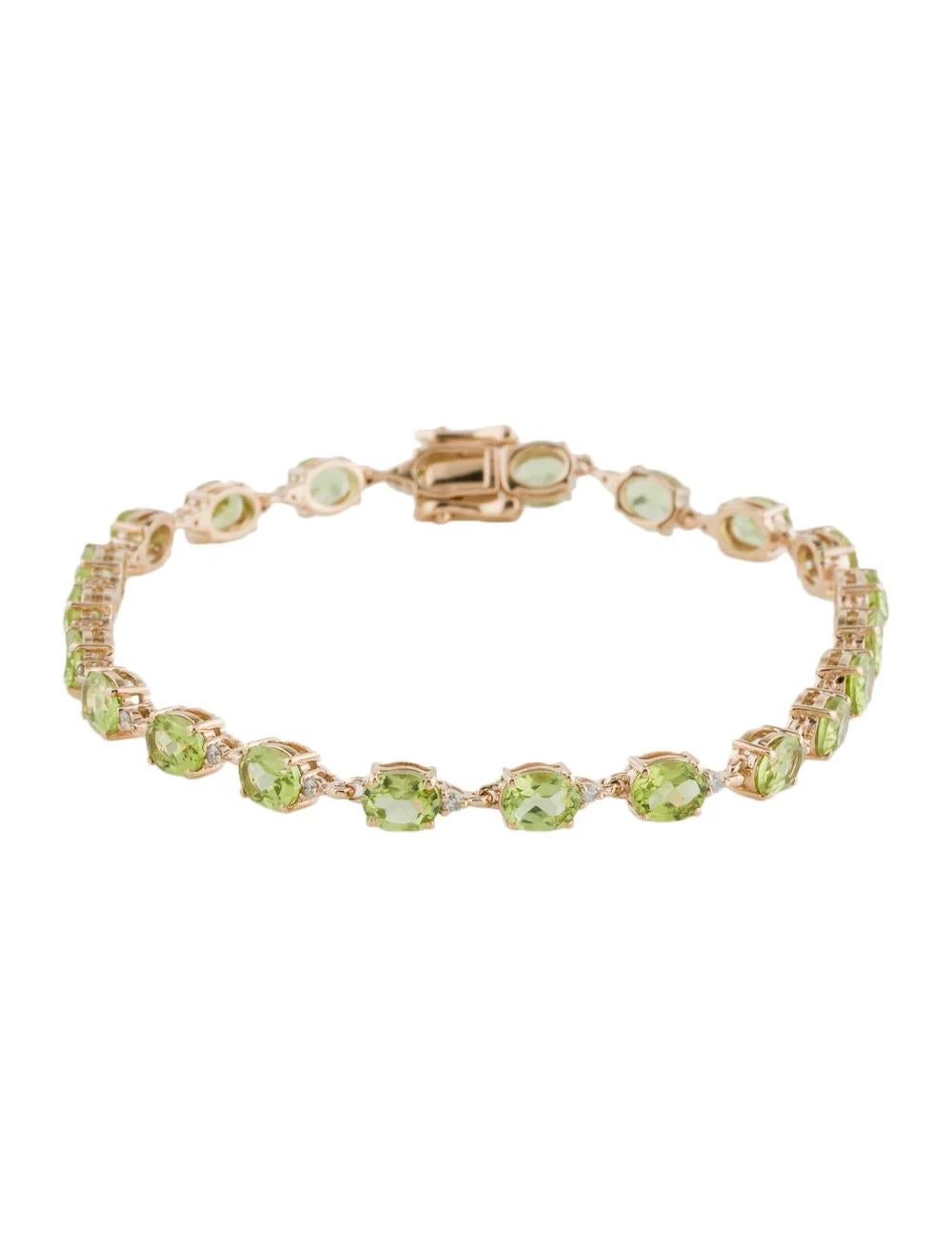 Enhance your jewelry collection with this elegant 14K Yellow Gold Link Bracelet adorned with captivating Oval Modified Brilliant Peridots and sparkling Diamonds. Crafted to perfection, this bracelet exudes sophistication and charm, perfect for