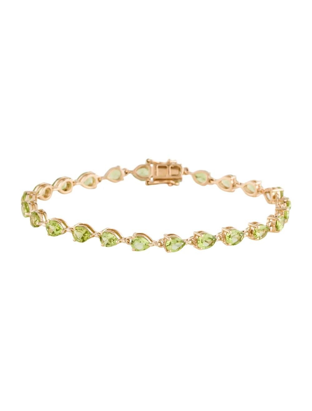 Introducing a captivating piece of fine jewelry, this exquisite 14K Yellow Gold Peridot Link Bracelet is a true statement of elegance and style. Crafted with meticulous attention to detail, it features a stunning 6.96 Carat Pear Brilliant Peridot,