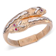 Pulsera tipo brazalete con bisagra, de estilo vintage, en oro rosa de 14k, con diseño de serpiente de dos cabezas