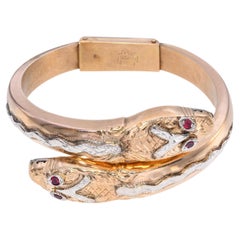 Pulsera tipo brazalete con bisagra, de estilo vintage, en oro rosa de 14k, con diseño de serpiente de dos cabezas