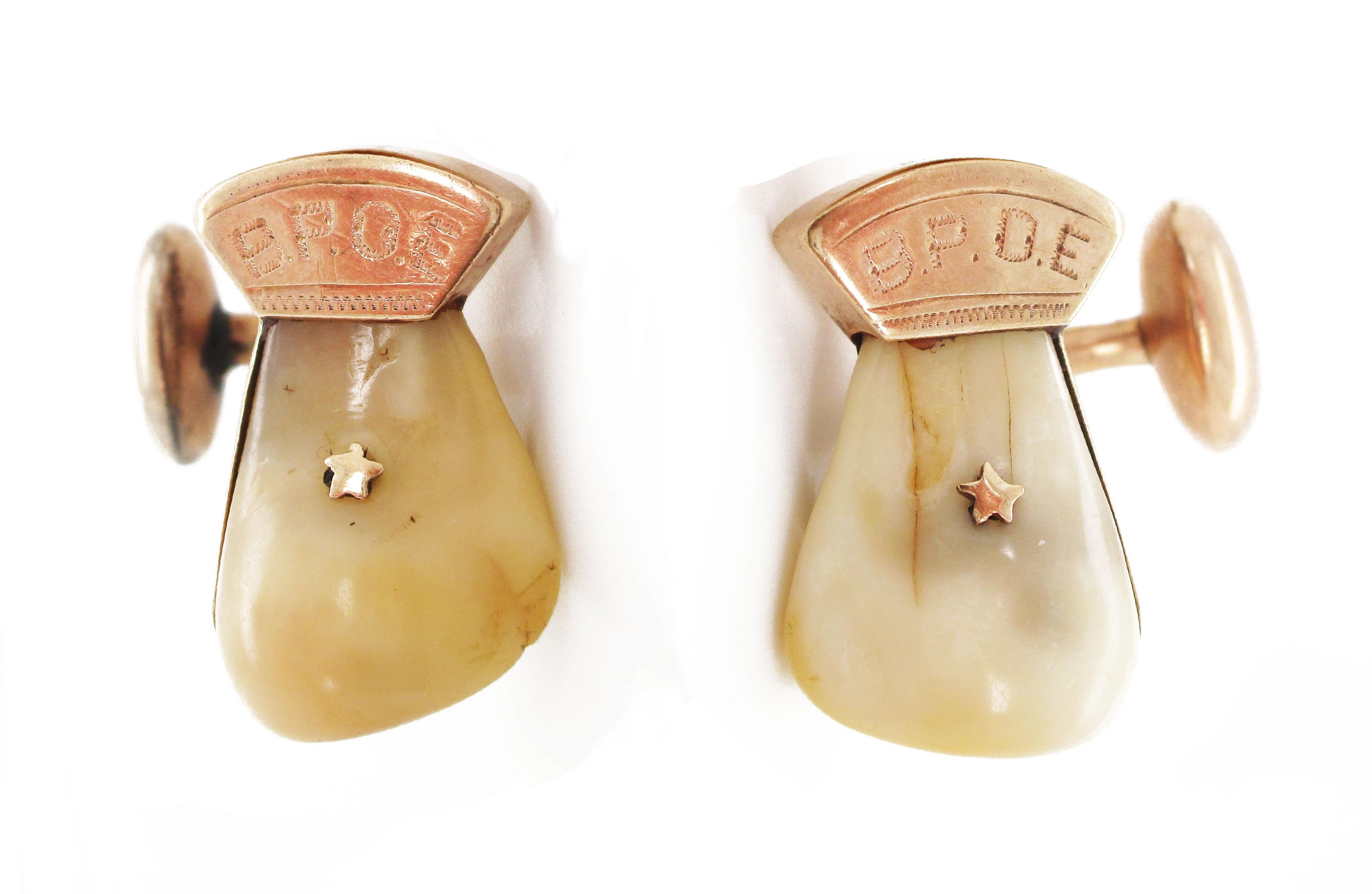These remarkably unique cufflinks feature rich 14k rose gold and an elk tooth center that combine to create a look of rugged sophistication that is almost unsurpassed! The juxtaposition of rose gold securing the ivory of the elk tooth makes these
