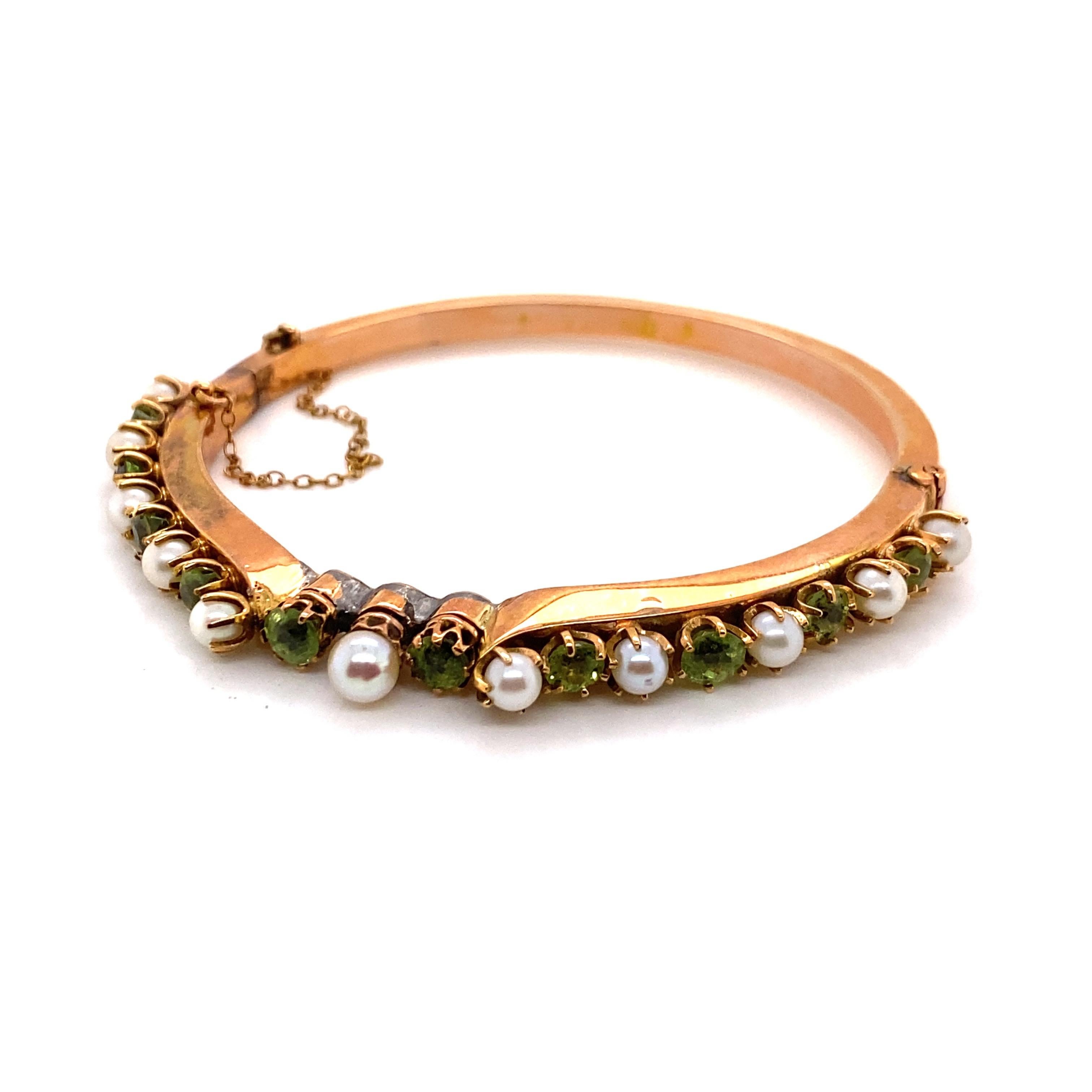 Vintage 14K Rose Gold Pearl and Peridot Bangle Bracelet In Fair Condition For Sale In Boston, MA