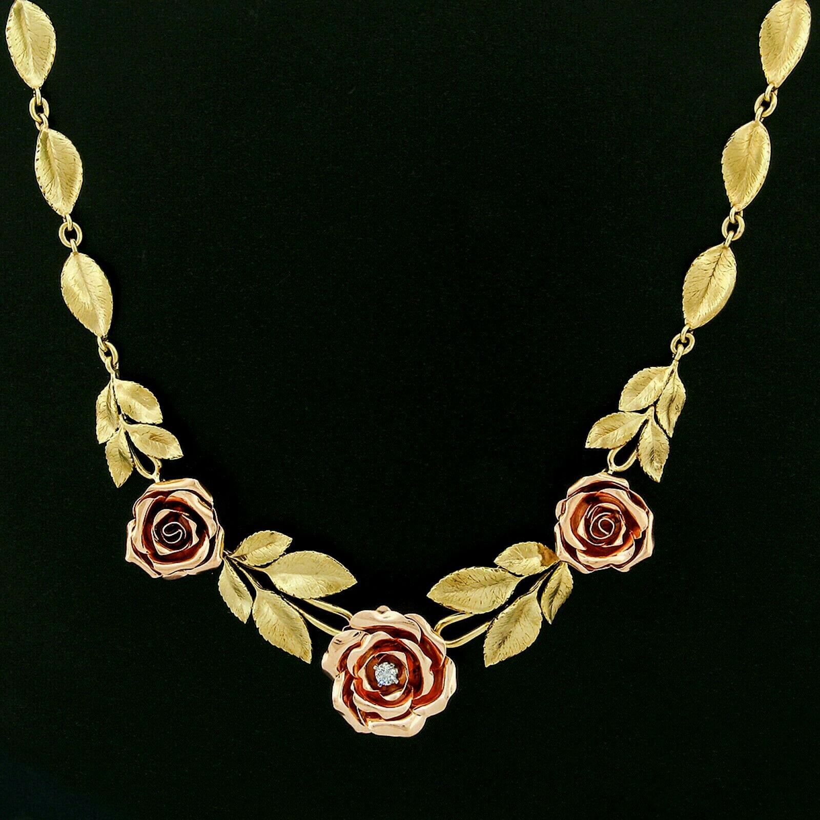 This outstanding vintage collier necklace is very finely crafted in solid 14k rose and green gold. The necklace features incredible detail with perfectly textured leaf links that show realistic venation patterns with soft and natural curves