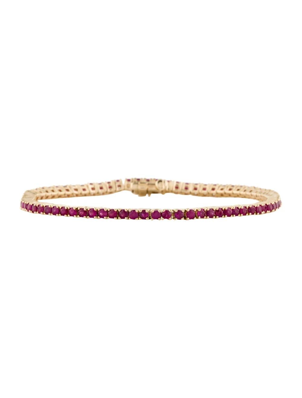 Elevate your style with this exquisite 14K Yellow Gold Ruby Link Bracelet, adorned with a stunning 2.66 carat Round Brilliant Ruby. Crafted to perfection, this bracelet exudes elegance and sophistication, making it a perfect addition to any jewelry