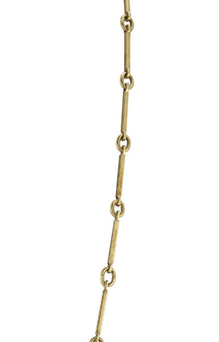 This solid gold vintage chain is sleek and chic whether worn alone, layered or with a fabulous pendant, charms or medallion. Weighty and eye catching this bar chain can stand out on its own.

Comprised of links designed with 4 sided bars with