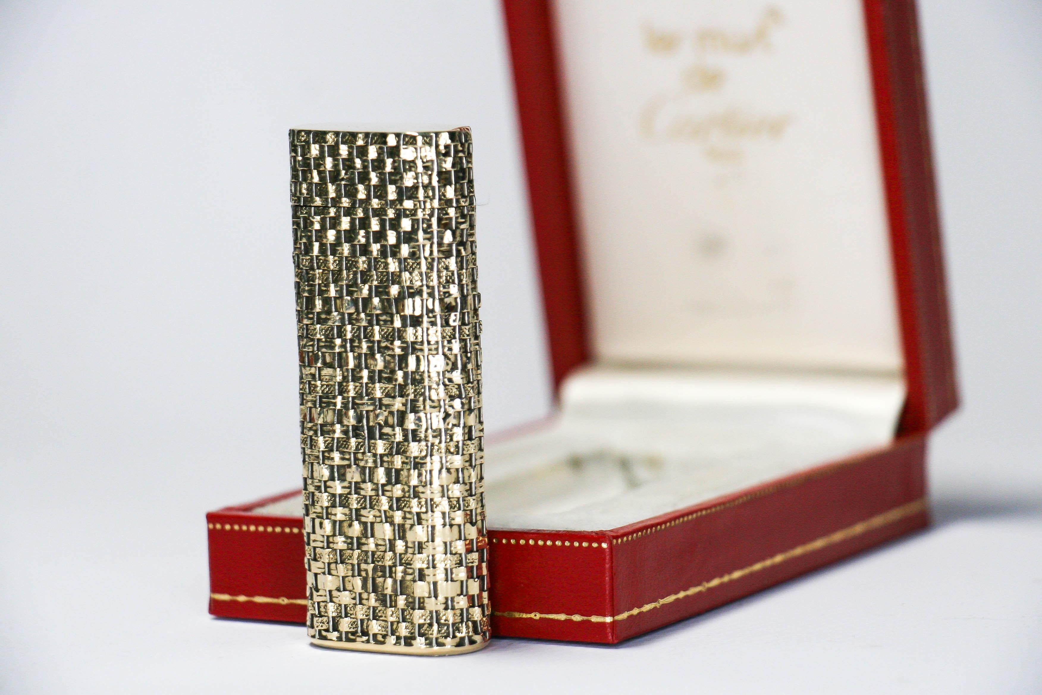 Vintage 14K Solid Gold Sleeved Cartier Les Must lighter

This absolute masterpiece of a lighter is a 14-karat solid gold-sleeved Cartier Les must lighter. Fully functional, sparks excellent, and does not leak. The lighter is in a rare complete lot,