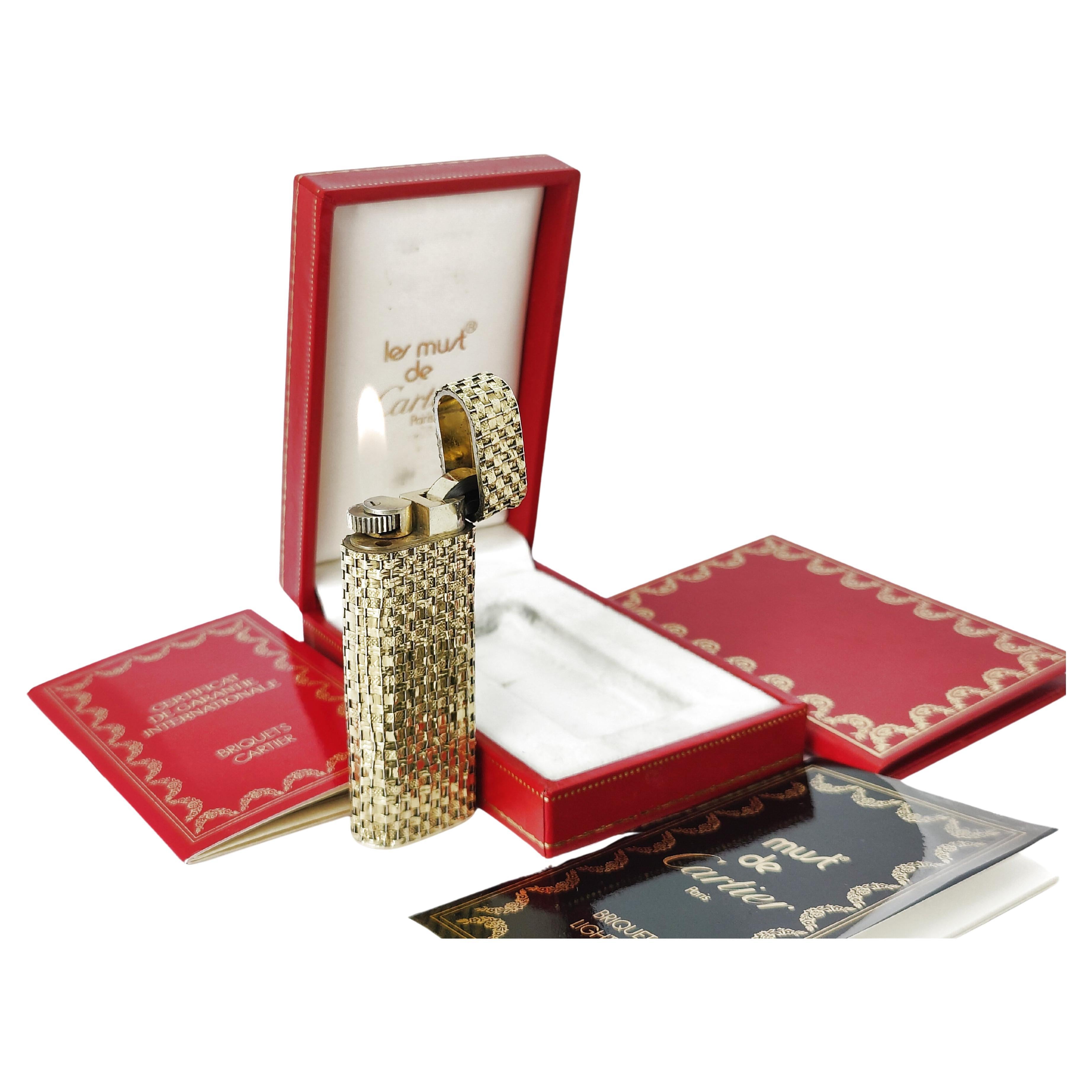 Cartier Les Must, briquet vintage à manches en or massif 14 carats, complet dans sa boîte, années 1970