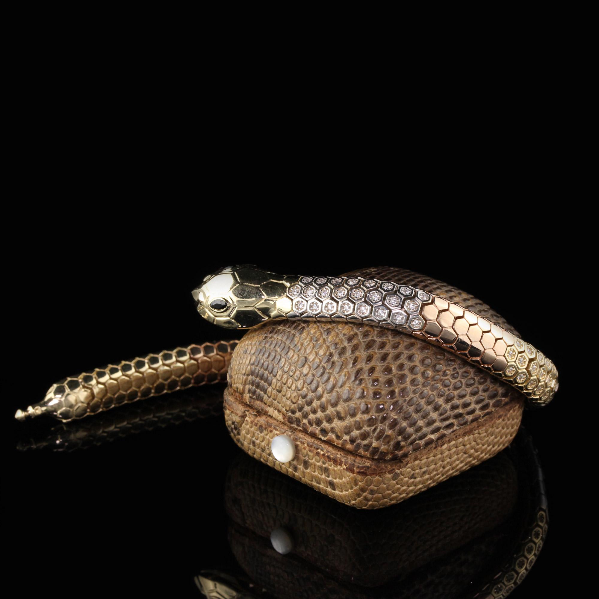 Gorgeous Vintage 14K Tri Tone Gold Diamond Snake Bracelet . This gorgeous bracelet is very intricate and in excellent condition. It has diamonds all on its back and has three different gold tones in it being yellow, rose, and white gold. The snake