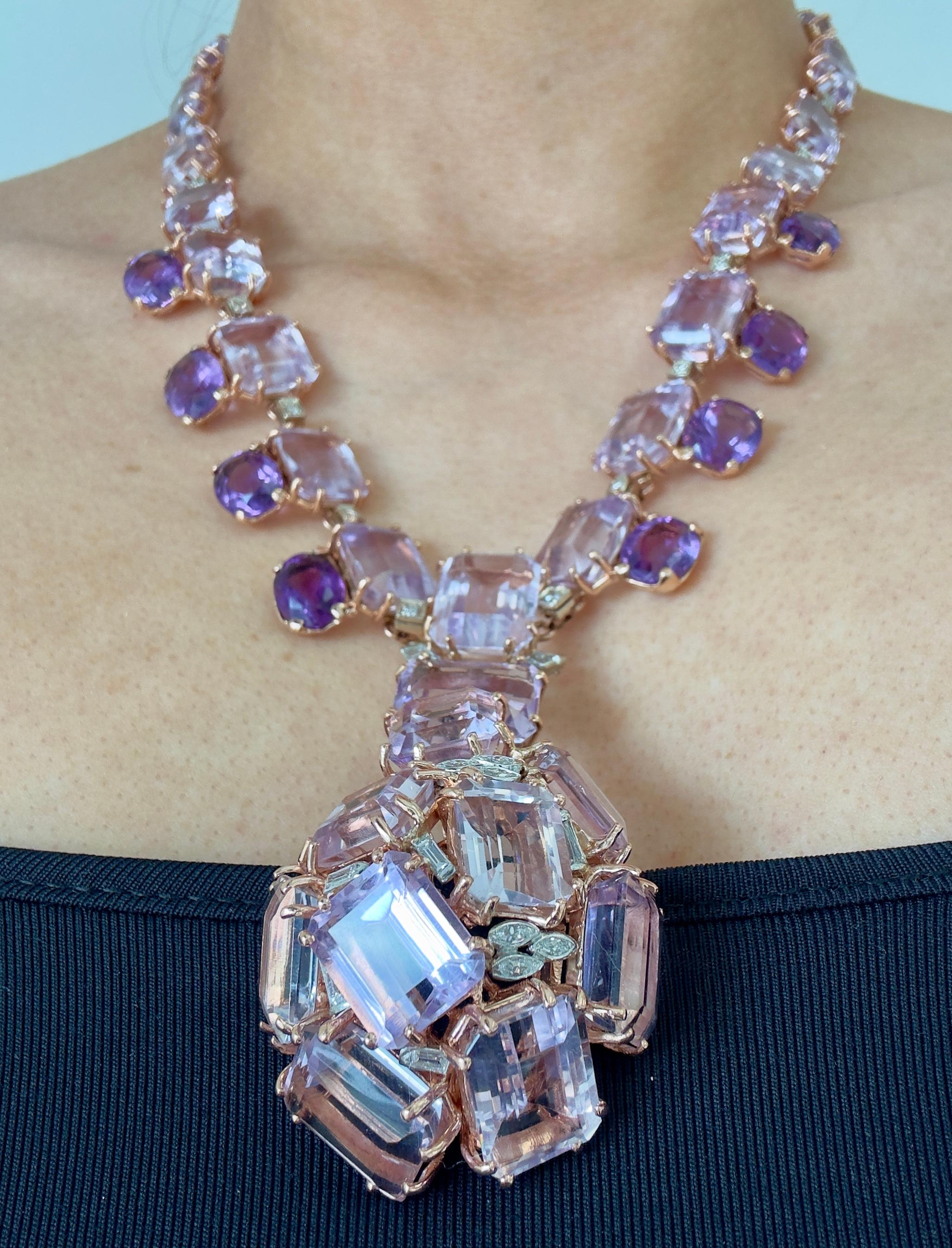 Vintage 1950s 14K Yellow and Rose Gold Amethyst and Diamond Necklace  
Includes a written appraisal by a GIA Master Graduate Gemologist, valuing this stunning vintage necklace at $24,495.  

Features:
  
Amethysts:  
- 9 Emerald-Cut Amethysts: