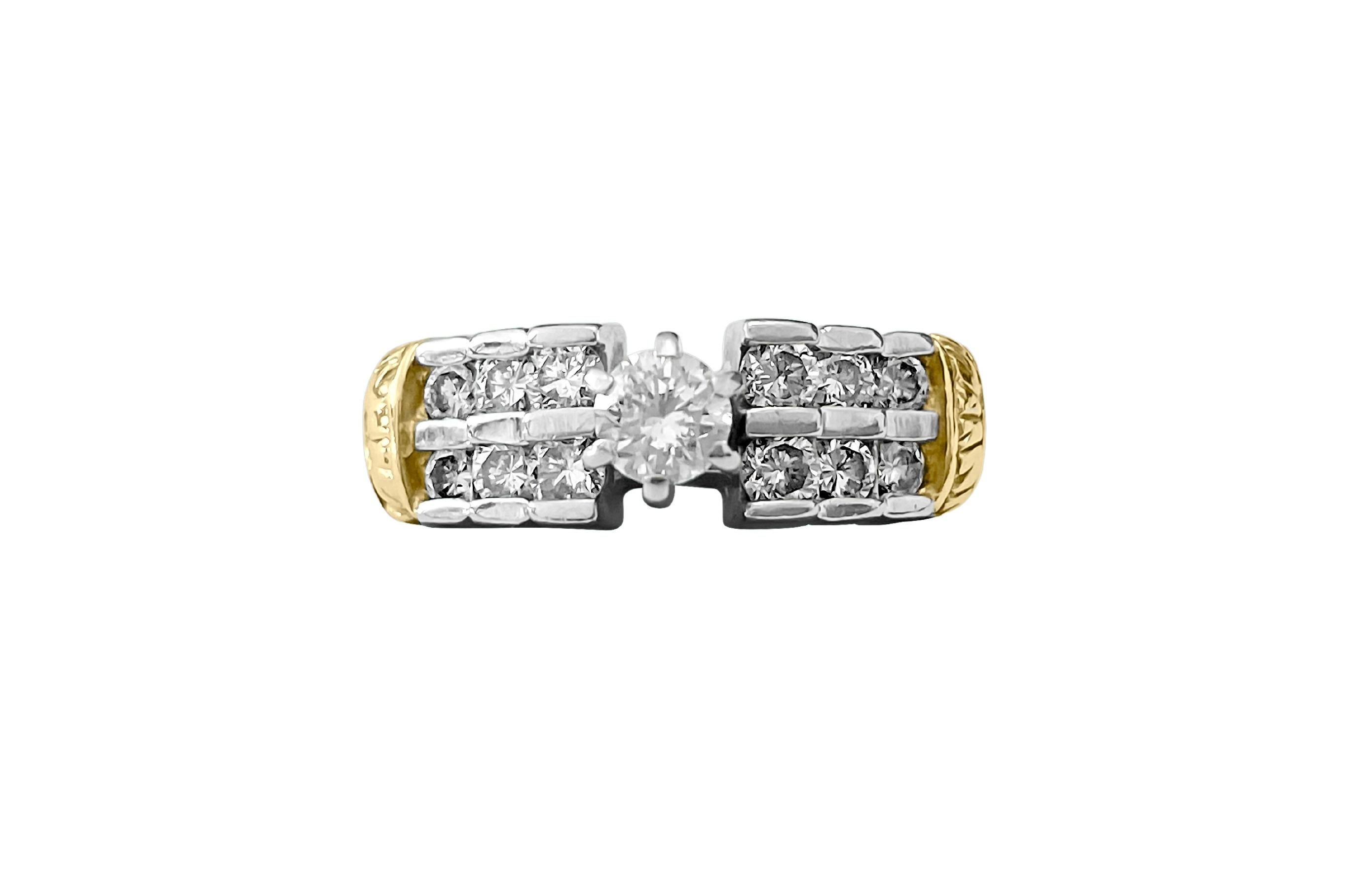 Crafted from 14K white and yellow gold in a stunning two-tone design, this ring features a sparkling 0.28 carat center diamond complemented by 0.35 carats of side diamonds, totaling 0.63 carats. With SI clarity and G color, these round brilliant-cut