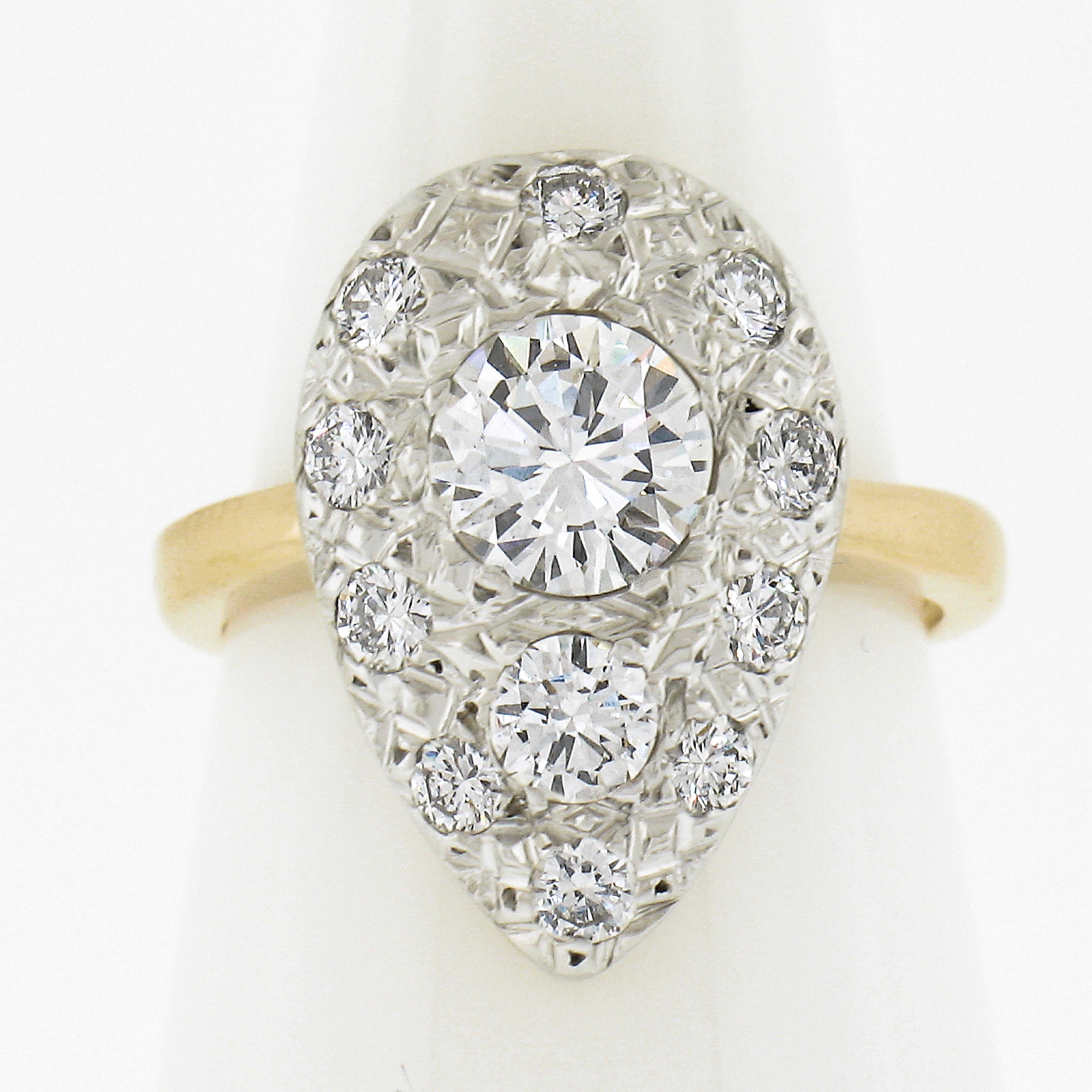 --Stone(s):--
(1) Natural Genuine Diamond - Round Brilliant Cut - Pave Set - H Color - VS1 Clarity - 0.75ct (approx.)
(11) Natural Genuine Diamonds - Round Brilliant Cut - Pave Set - G -IColor - VS1-SI1 Clarity - 0.40ctw (approx.)
Total Carat