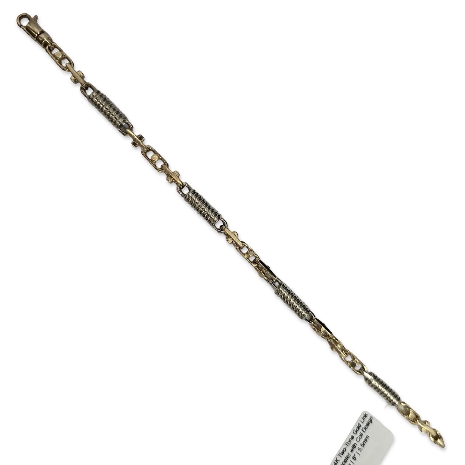 Ein kühnes Armband aus zweifarbigem 14-karätigem Gold mit markantem Glieder- und Spiral-Design. Das aus Gelb- und Weißgold gefertigte Schmuckstück wiegt 26,5 Gramm und ist 8 Zoll lang und 5,5 mm breit. Die abwechselnd angeordneten Glieder und