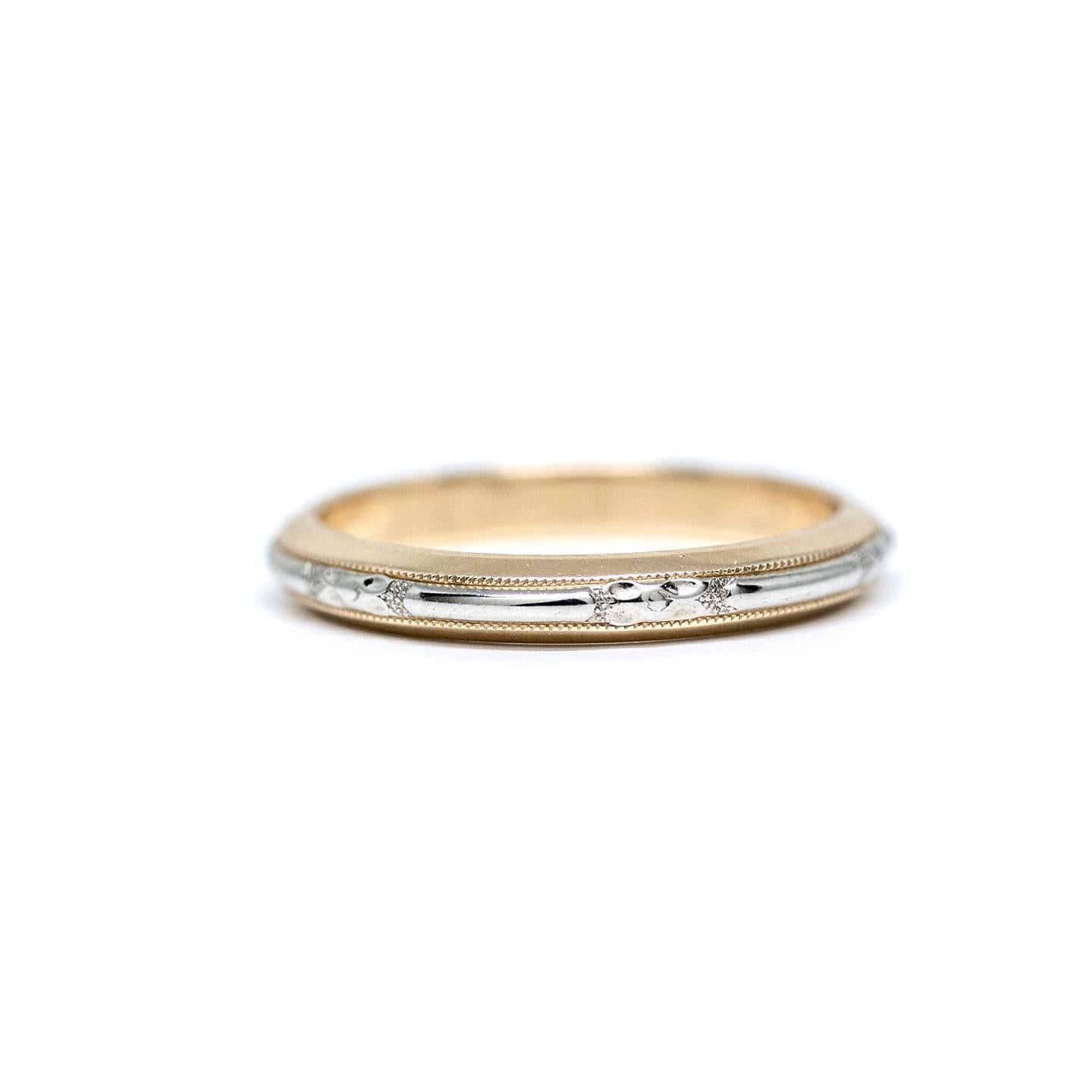 Here we have a genuine Art Deco wedding band crafted in 14 karat 