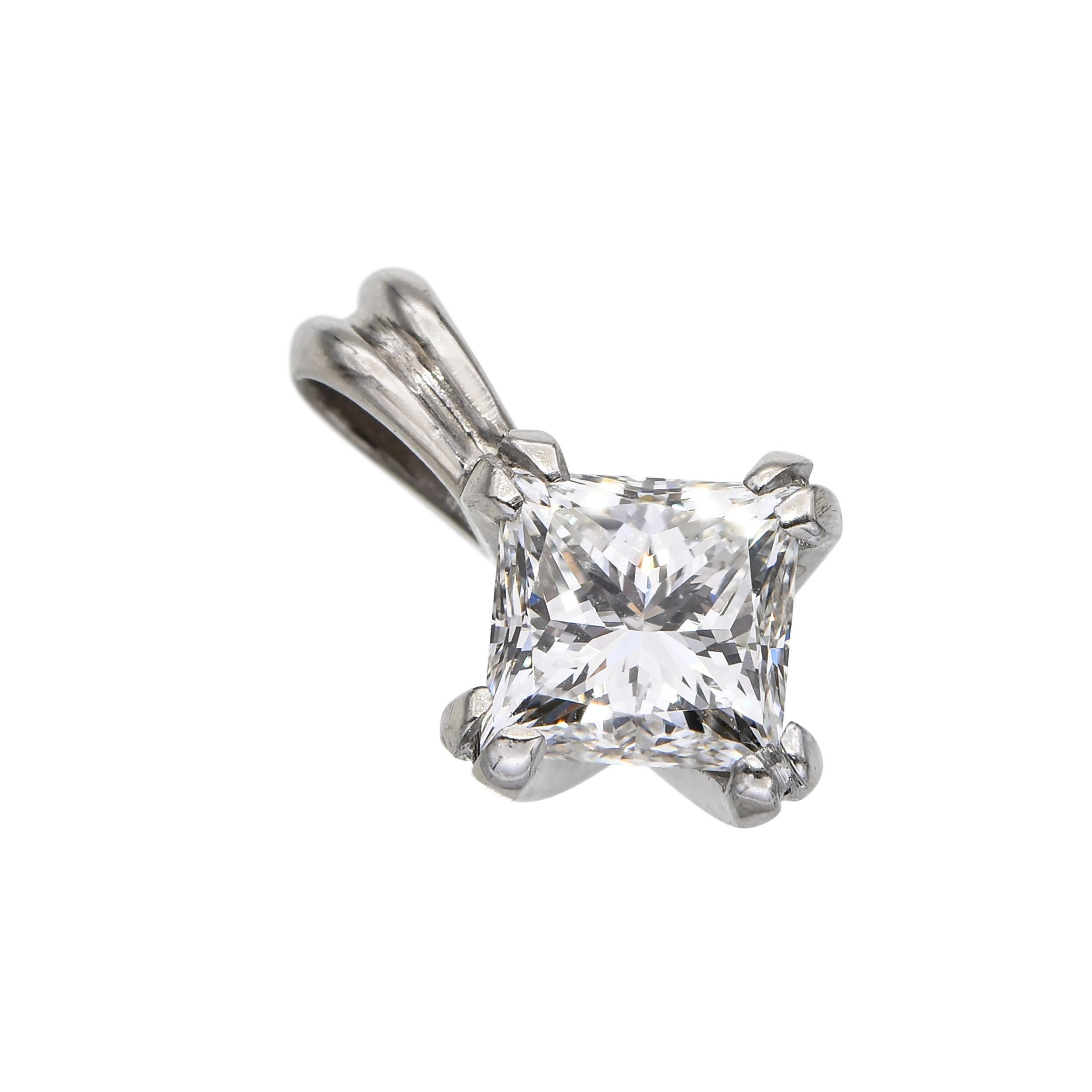 This vintage 14k white gold pendant features a 0.68tcw H VS diamond, showcasing classic elegance and timeless design. The pendant’s clean lines and high-quality craftsmanship highlight the brilliance of the central diamond. Its versatile style makes