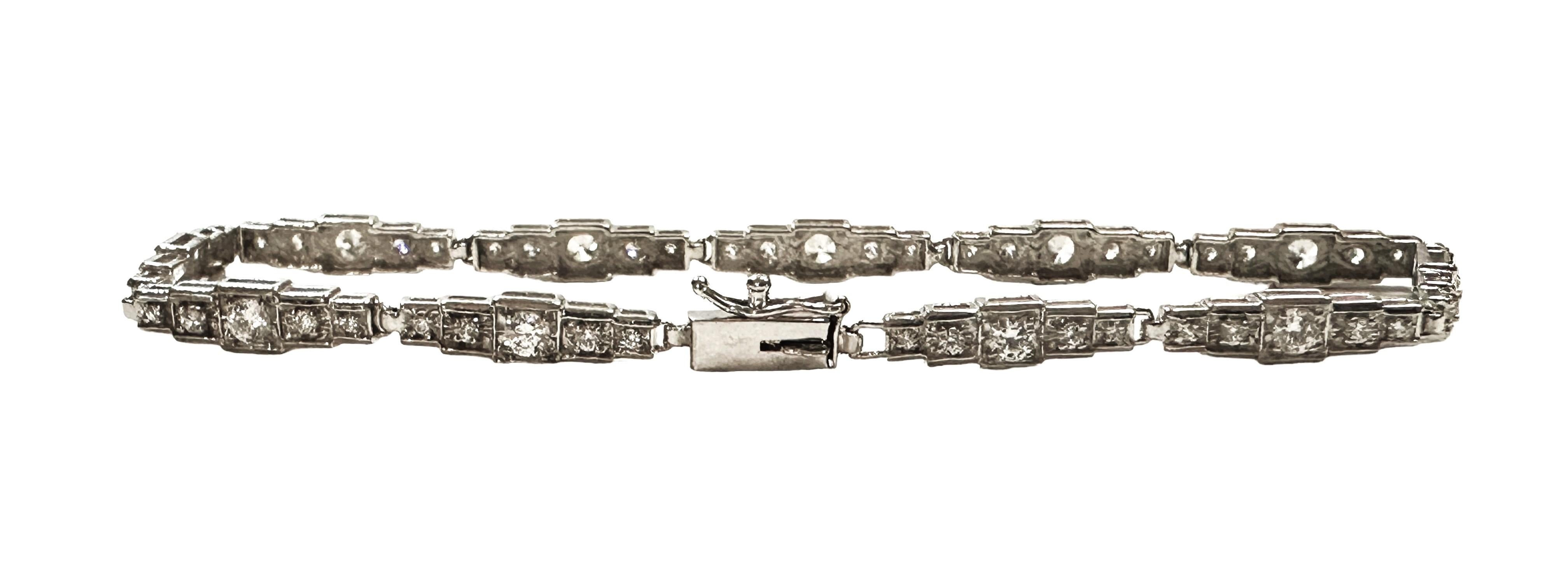 What a gorgeous bracelet!!  It is just dainty and beautiful.  The stones are crystal but they glisten like diamonds.  The bracelet is 7 inches long and has a slide closure along with a safety clasp. It is stamped 