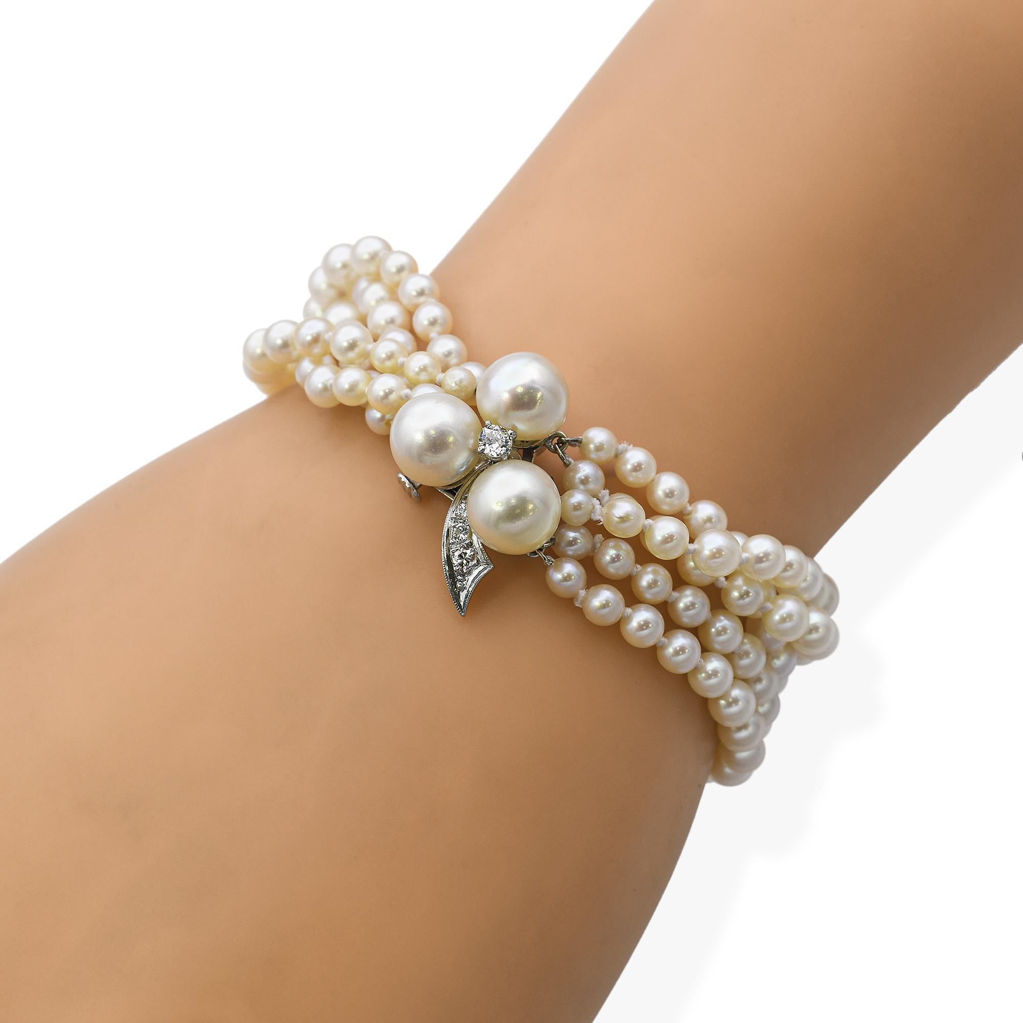 Taille ronde Bracelet vintage à 4 rangs de perles en or blanc 14 carats et diamants en vente