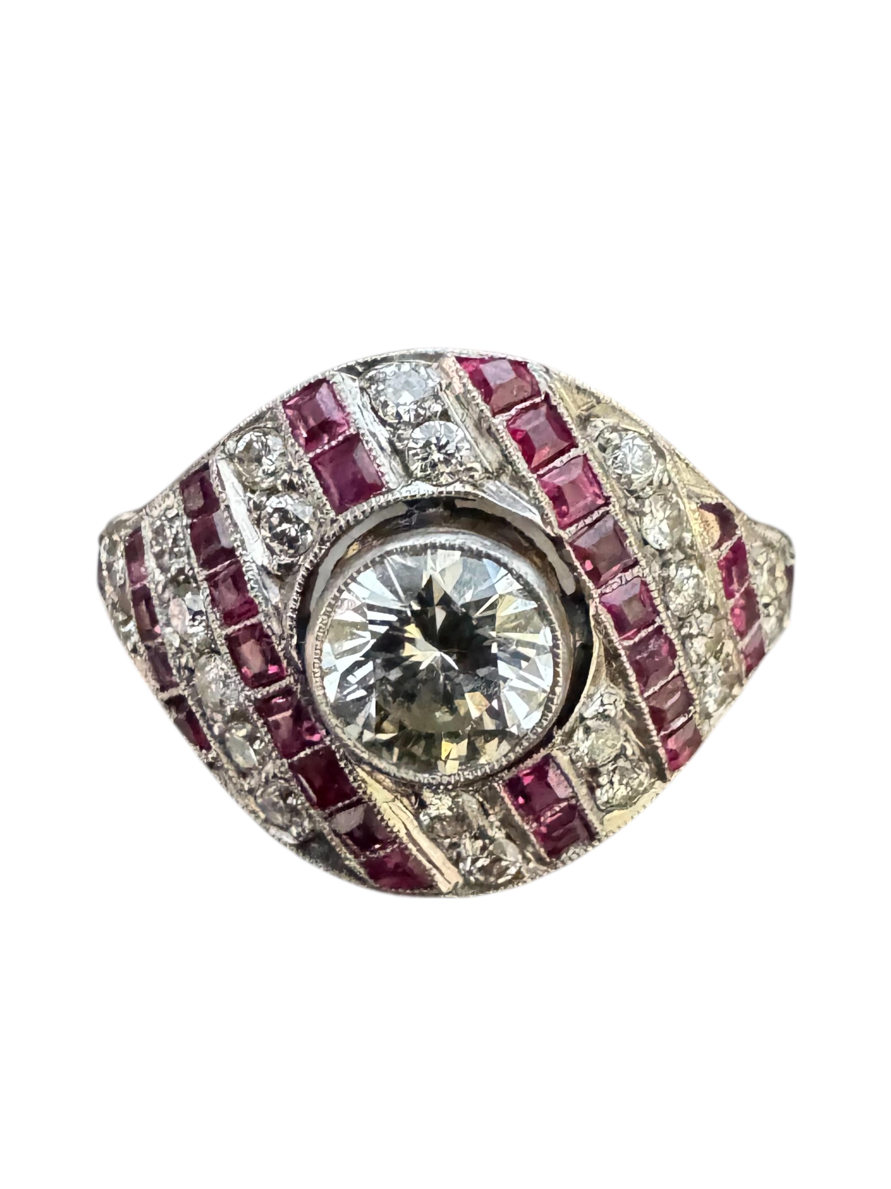 Anello con diamanti e rubini: brillante centrale da 0,70 carati, diamanti da 0,44 carati, rubini da 0,60 carati.

