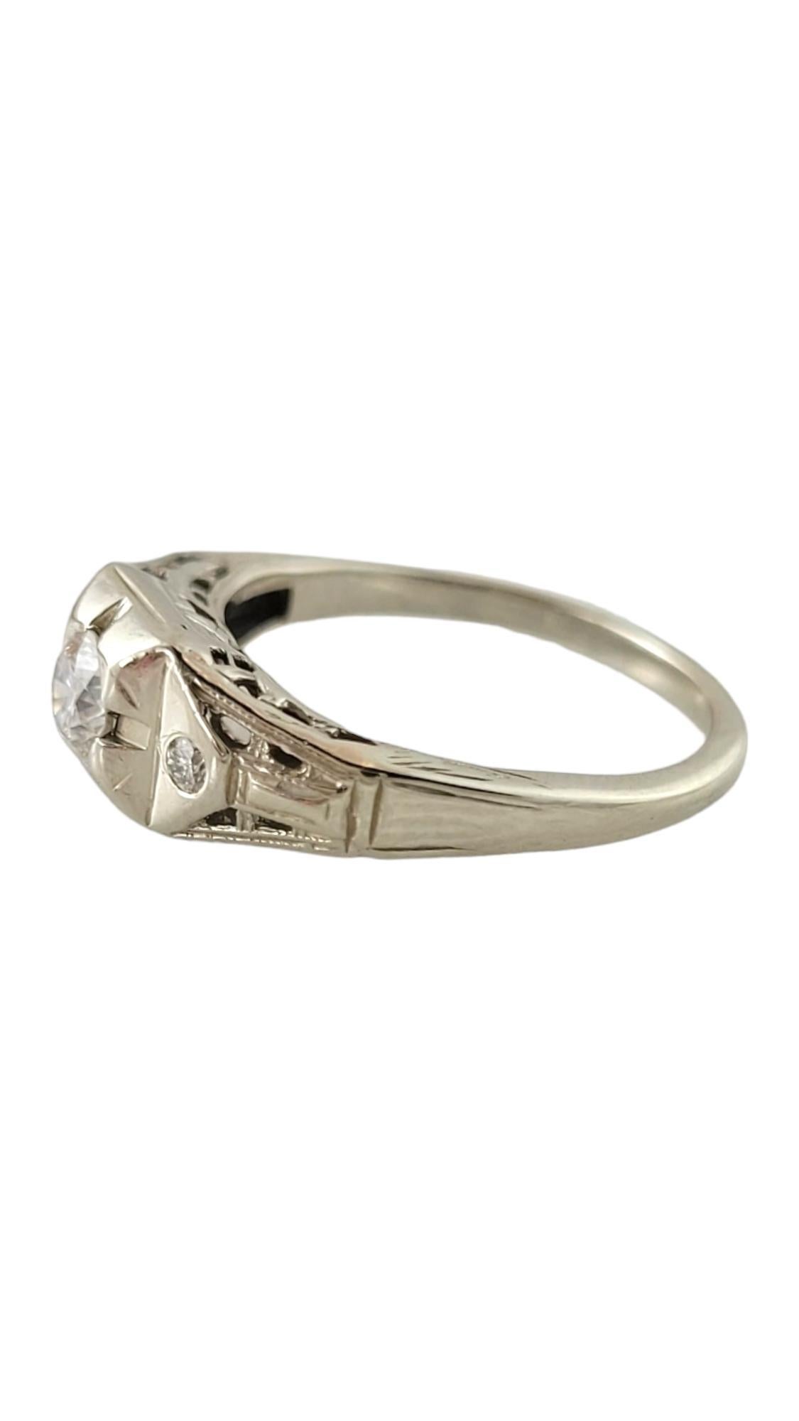 Vintage 14K White Gold Diamond Ring Size 4.75

This beautiful ring is meticulously crafted from 14K white gold and features 3 sparkling round brilliant cut diamonds!

Approximate total diamond weight: .19 cts

Diamond color: I-J

Diamond clarity: