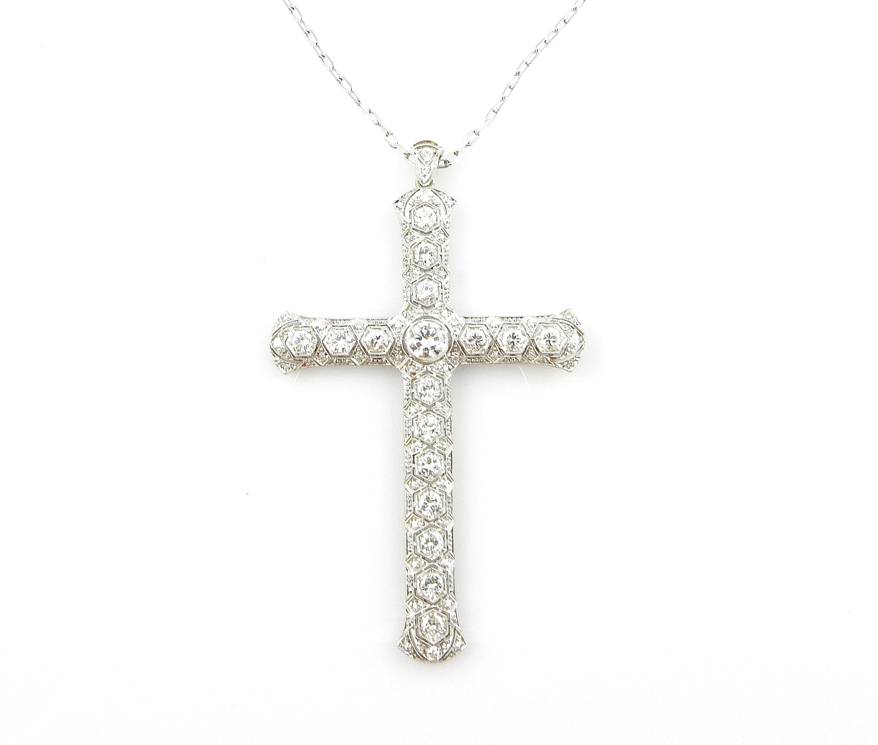 Vintage 14K White Gold Large Diamond Cross Pendant Necklace

This gorgeous statement piece is set with 62 round diamonds totally approx. 3.51 carats

Larger diamonds are round brilliant stones, with smaller single cut stones accenting the