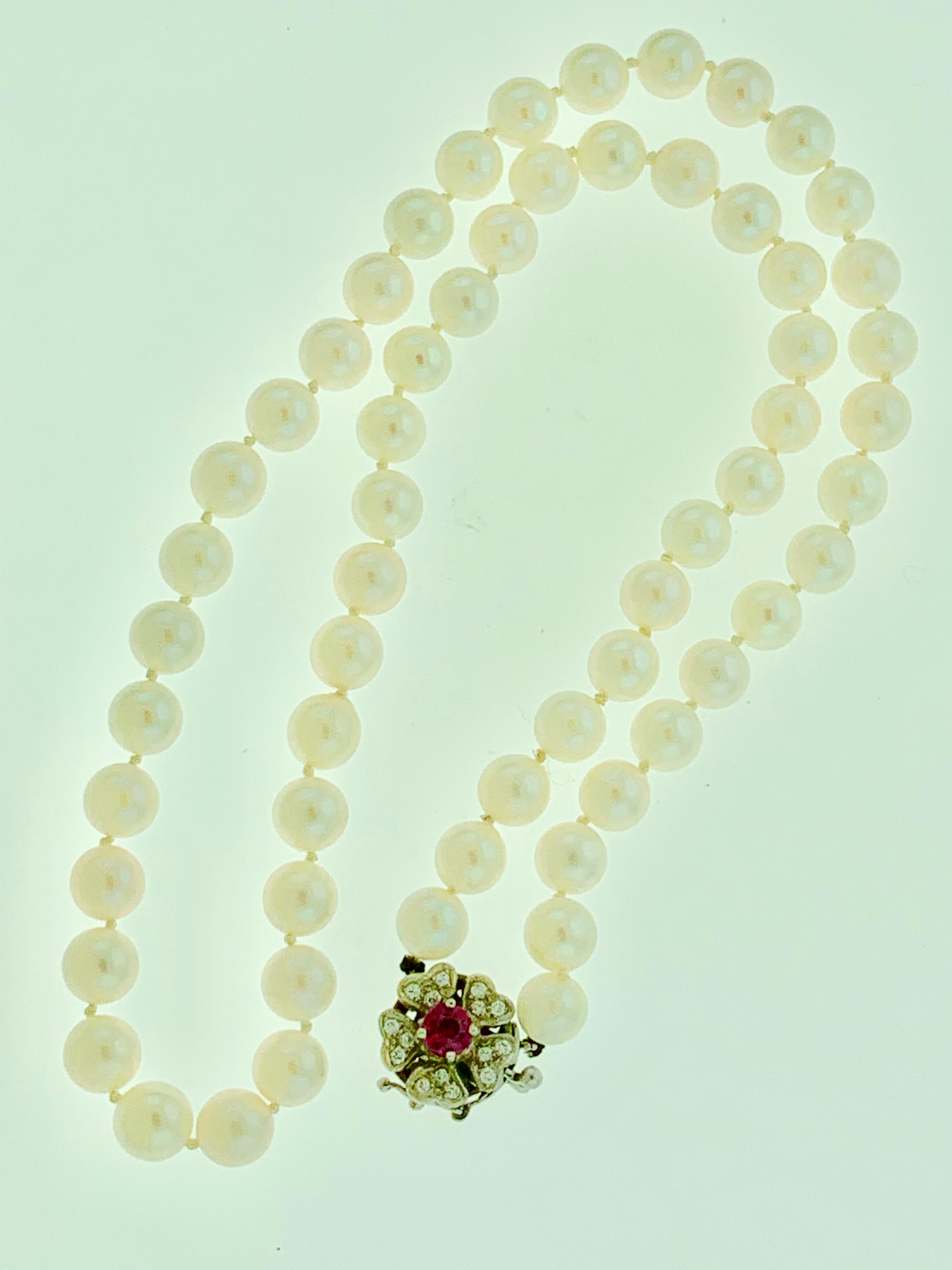 Vintage 14 Karat White Gold Pearl Strand Necklace with Diamond and Ruby Clasp In Excellent Condition In New York, NY