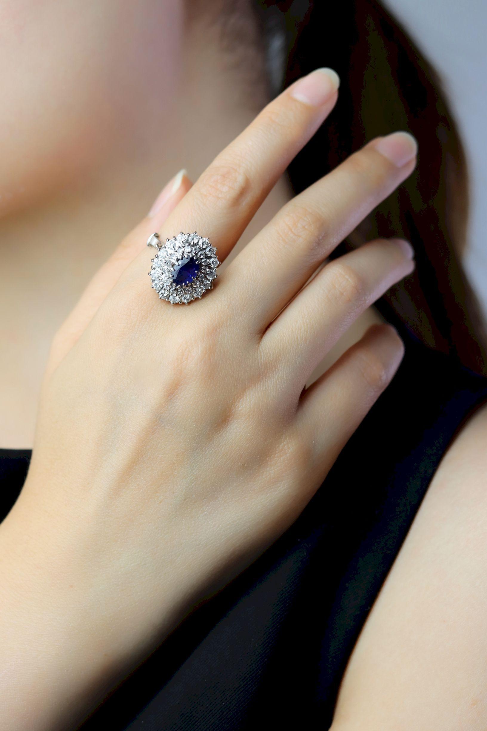 Vintage 14K White Gold Sapphire Diamonds Ring

Approximate Dimensions:
7.5 - 7.75 (Ring Size) 
1.9 cm (Width)
Approx. 1.39 carat (Sapphire)
Approx. 1.76 carat (Diamond)
7.9 grams in weight.

* All dimensions listed above are approximations based on