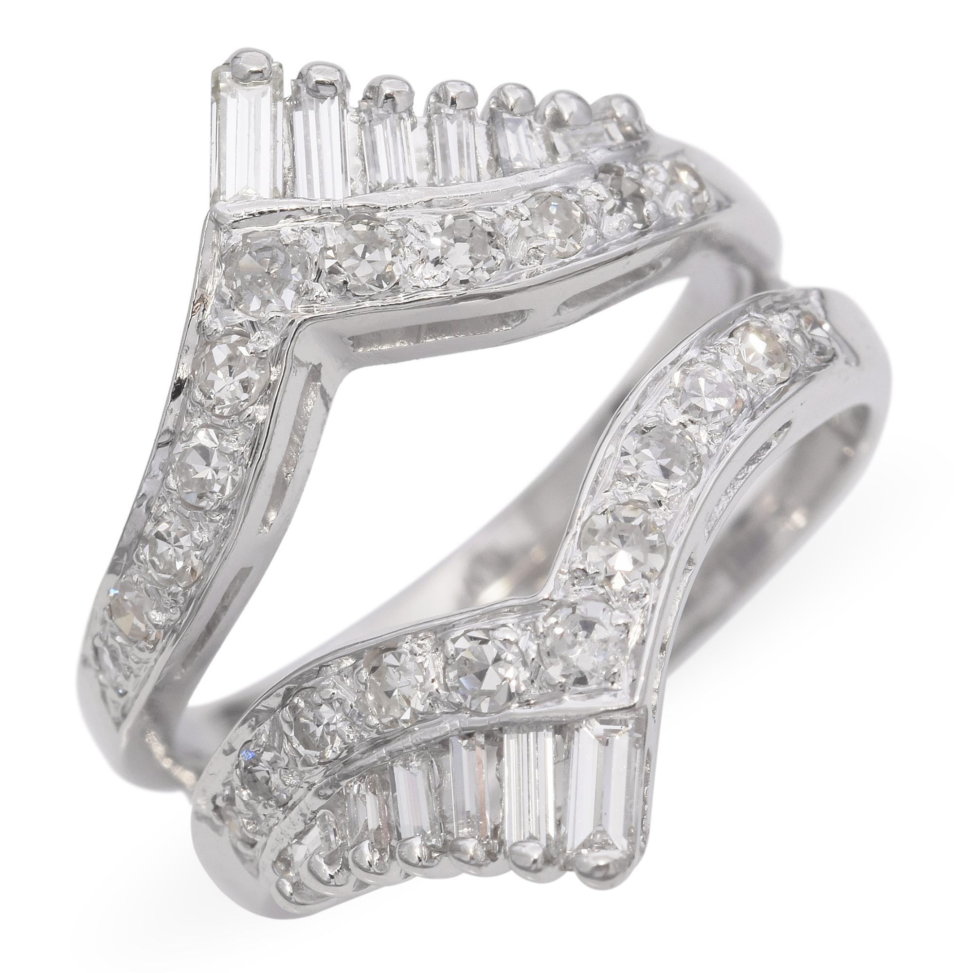 This vintage ring is crafted in 14k white gold and features a split band design that adds dimension and elegance. At the center, sparkling diamonds are set in a graceful arrangement, creating a refined focal point. The open band detail gives it a