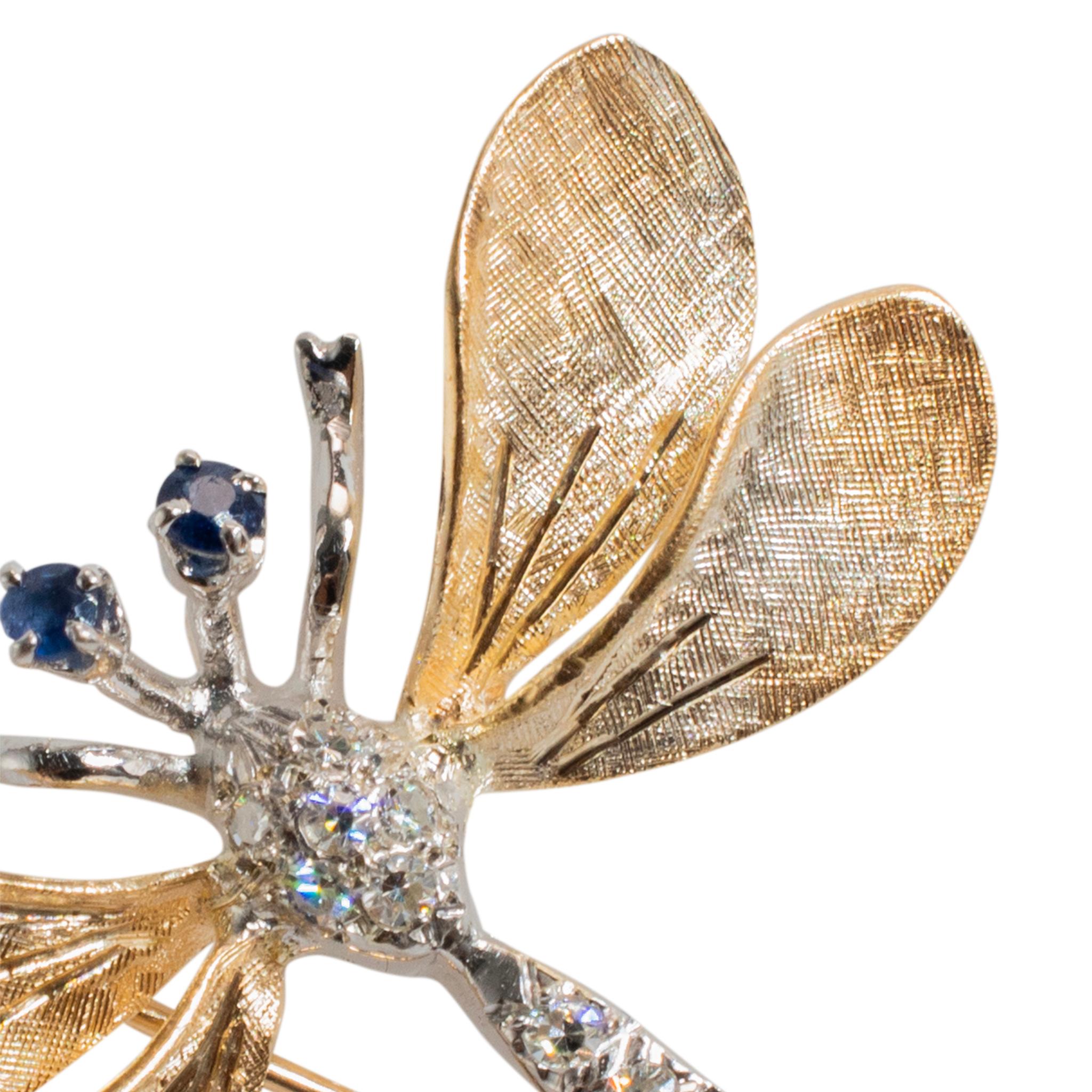 Genre : Femmes

Type de métal : Or blanc et jaune 14K

Longueur : 1.50 pouces

Poids : 

Broche vintage en or blanc et jaune 14K faite à la main, représentant un animal, des diamants et des saphirs.  Gravé 