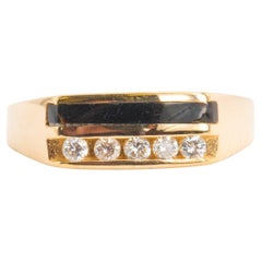 Anillo vintage de oro amarillo de 14 quilates con 0,25 quilates de diamantes y ónix