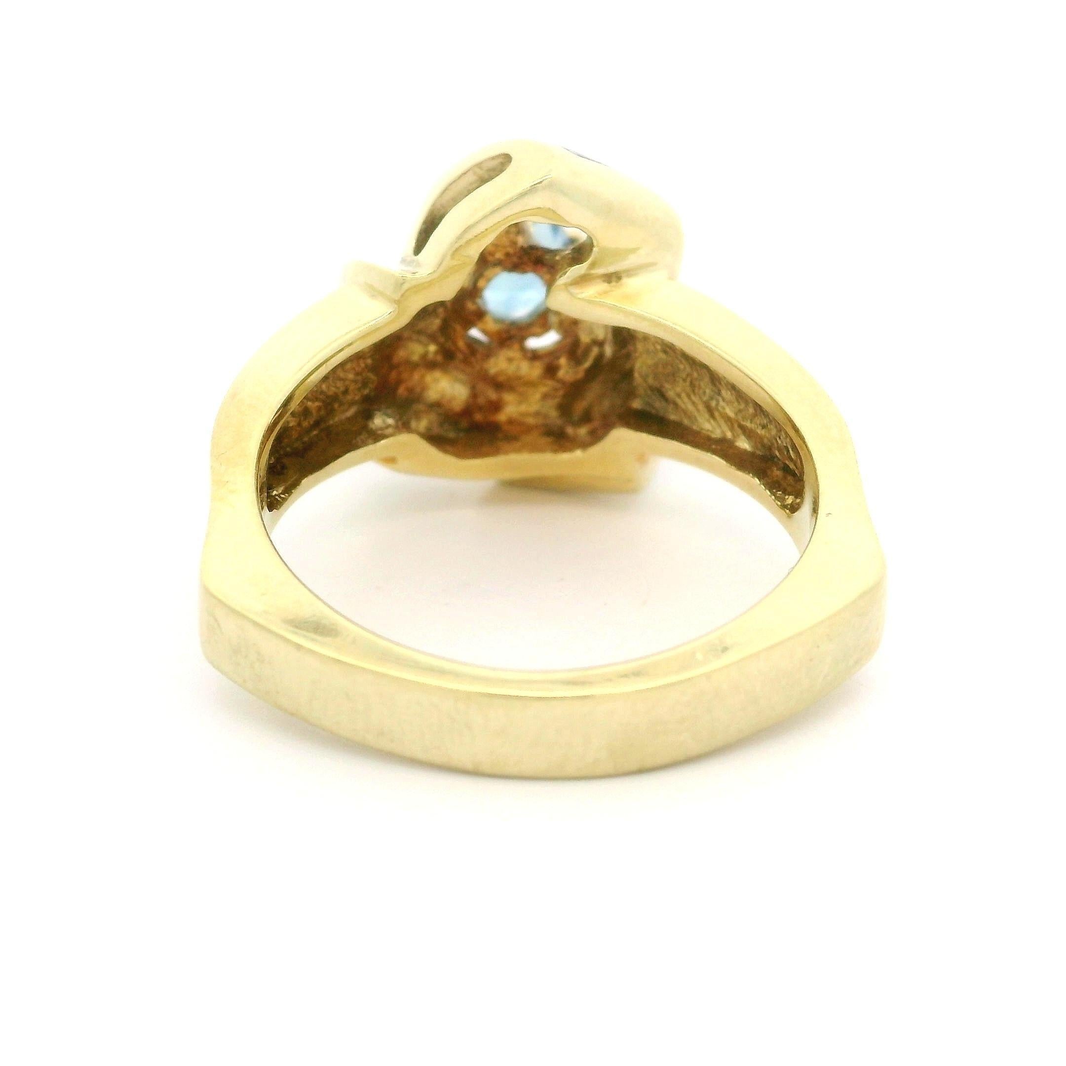 Bague nœud infini vintage en or jaune 14 carats avec aigue-marine 0,56 carat et émail bleu en vente 3