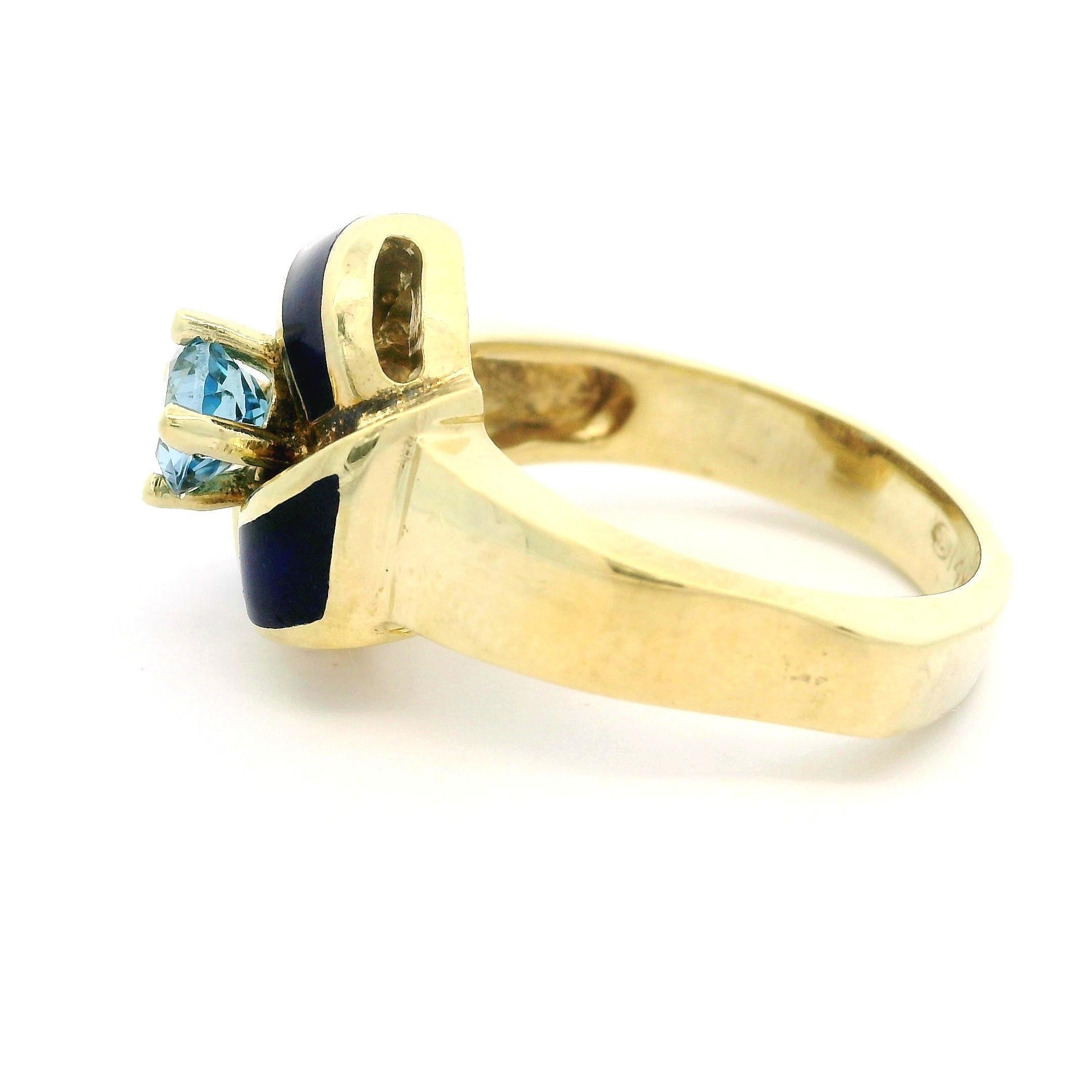 Bague nœud infini vintage en or jaune 14 carats avec aigue-marine 0,56 carat et émail bleu en vente 4