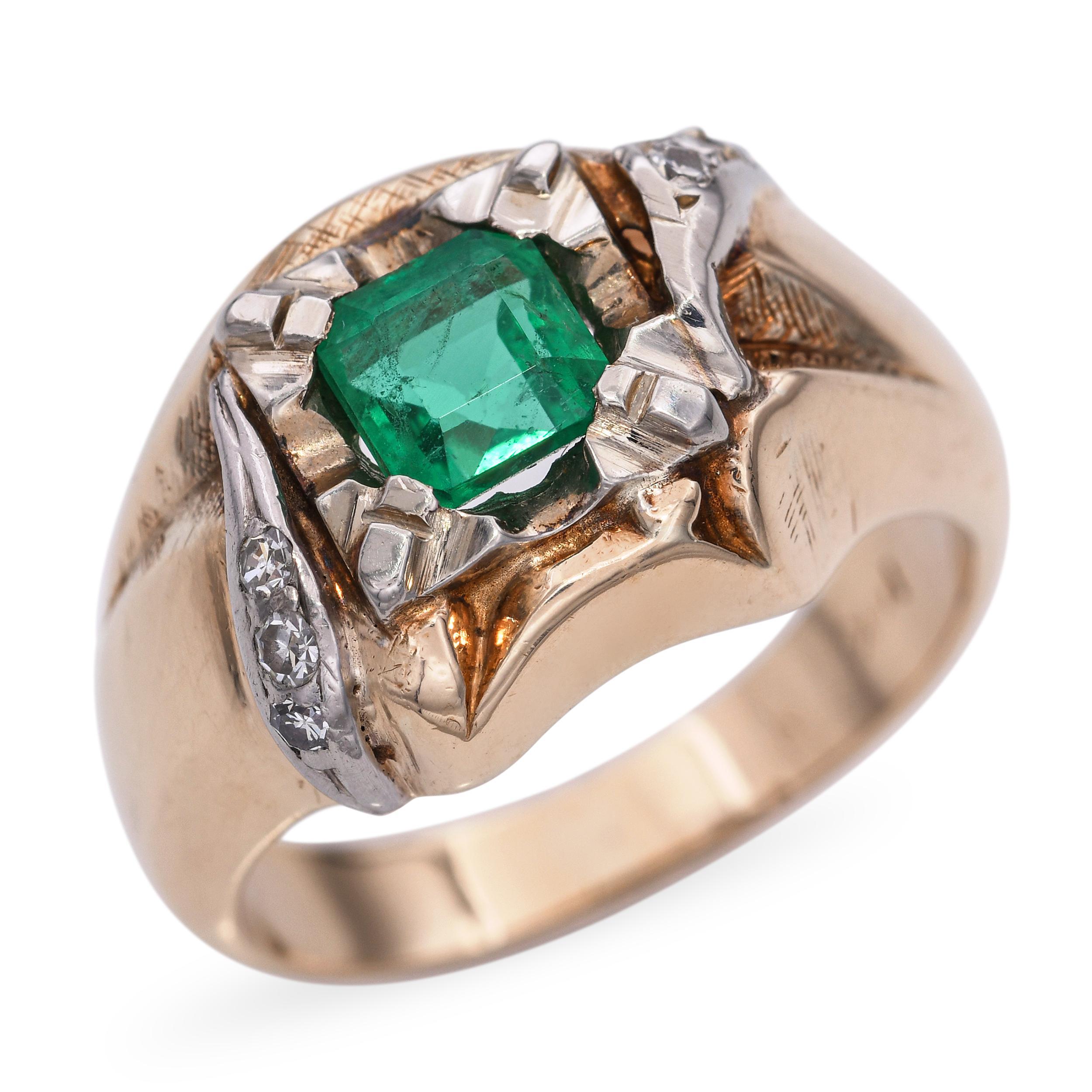 This vintage 14k yellow gold ring showcases a richly colored 0.68ct emerald at its center, framed by sparkling diamond accents. The contrast between the vibrant green and warm gold creates a classic and elegant look. Delicate prong settings