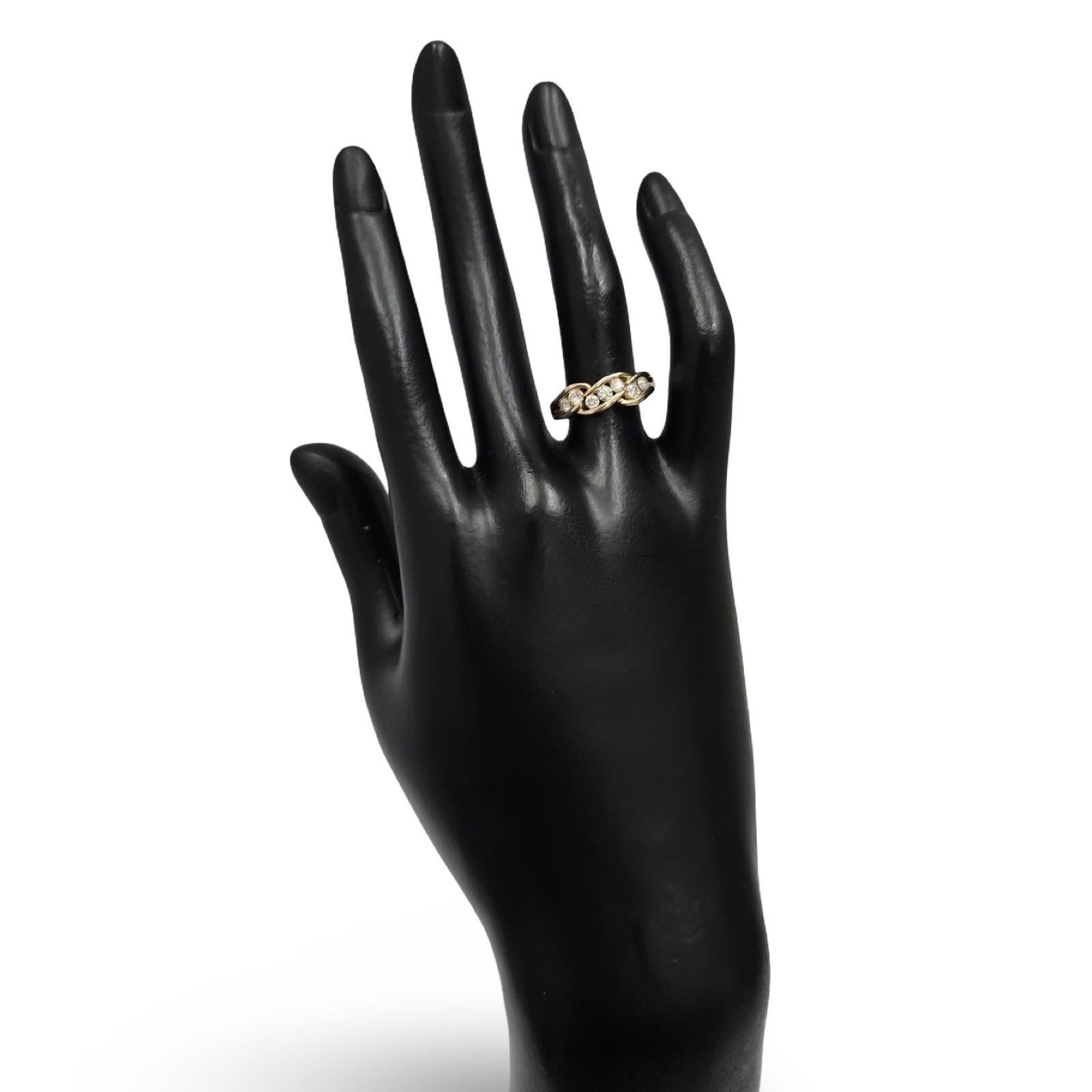 Timeless and elegant, this vintage diamond band is crafted in rich 14K yellow gold and set with approximately 0.70 carats total weight of natural diamonds. Designed as a classic band, it offers a refined sparkle with every angle, balancing