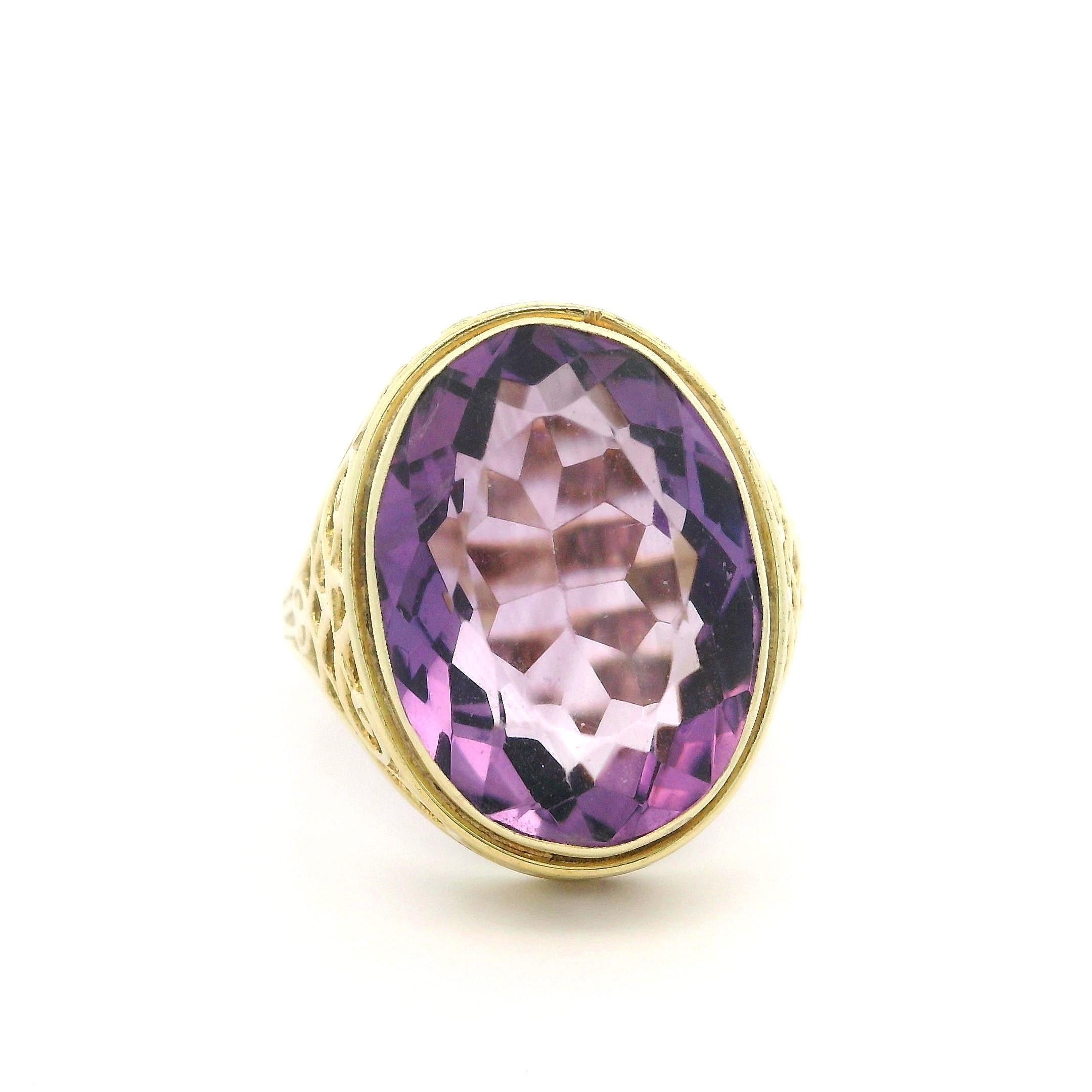 --Stone(s):--
(1) Natural Genuine Amethyst - Oval Cut - Bezel Set - Medium Purple Color - 18.7x13.6mm - 10.75ct(approx.)

Material: Solid 14K Yellow Gold 
Weight: 8.54 Grams
Ring Size: 11.0 (Fitted on a finger. We can custom size this ring. - Please